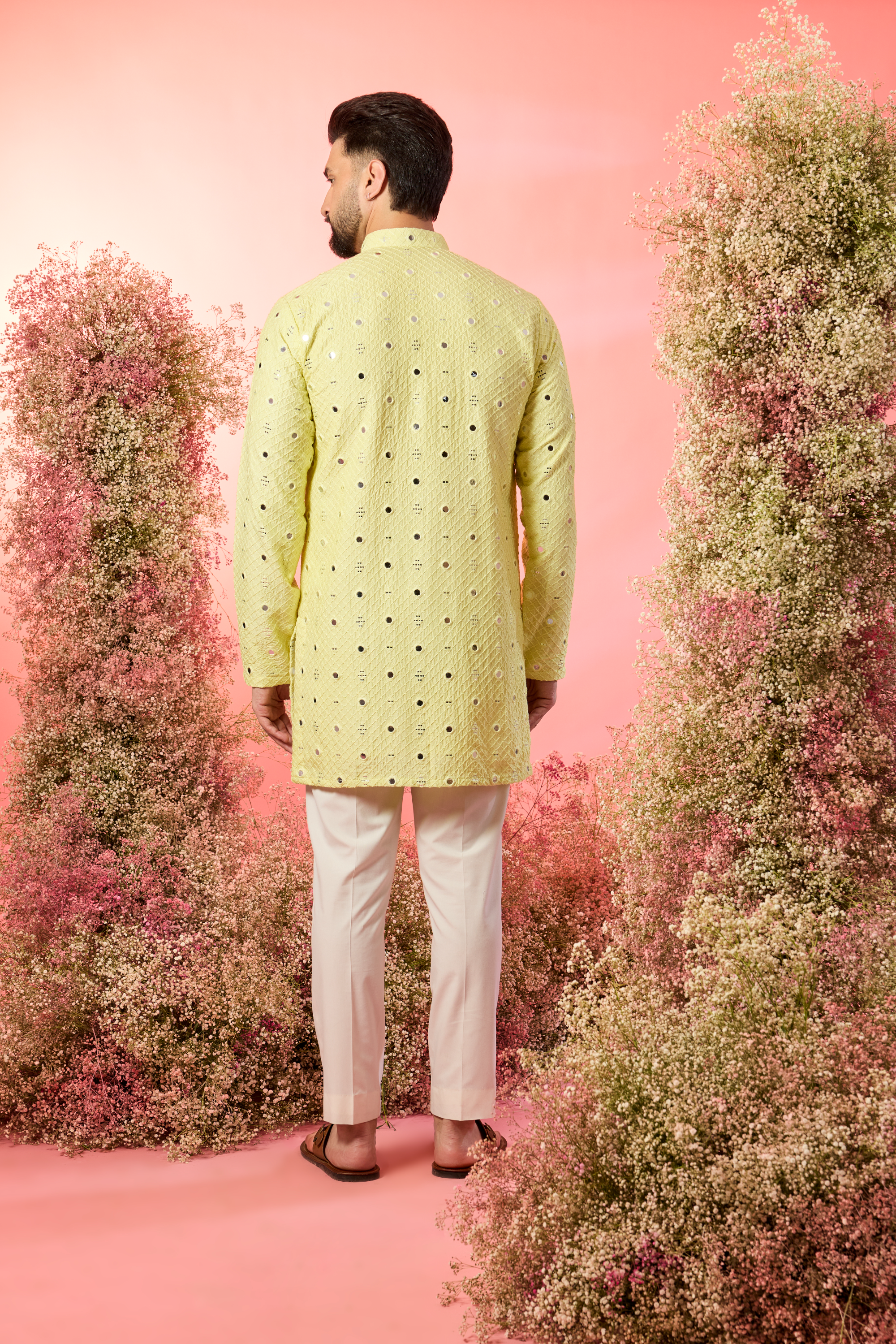yellow short kurta with delicate mirror work