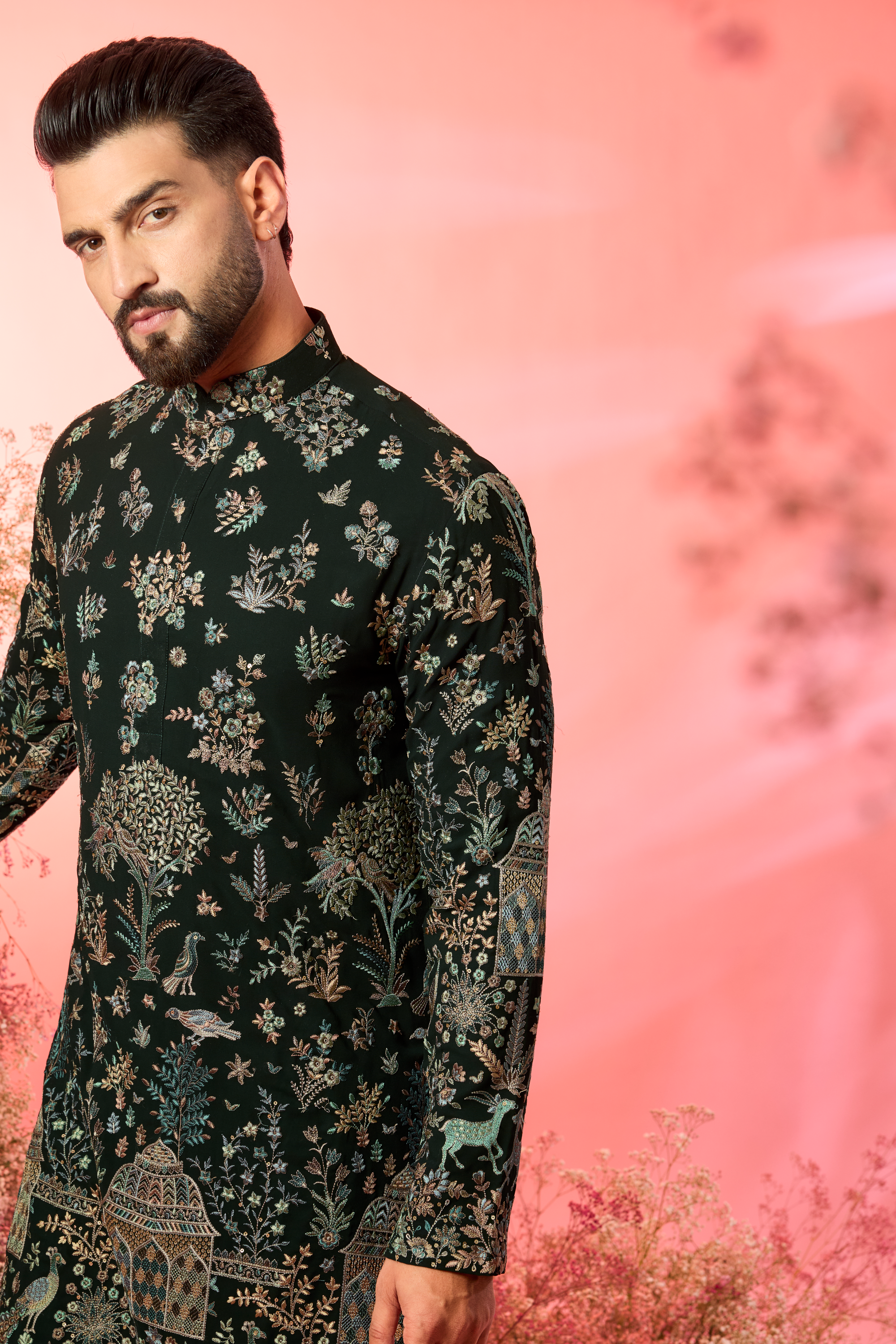 green chinakari kurta with intricate flora and fauna embroidery