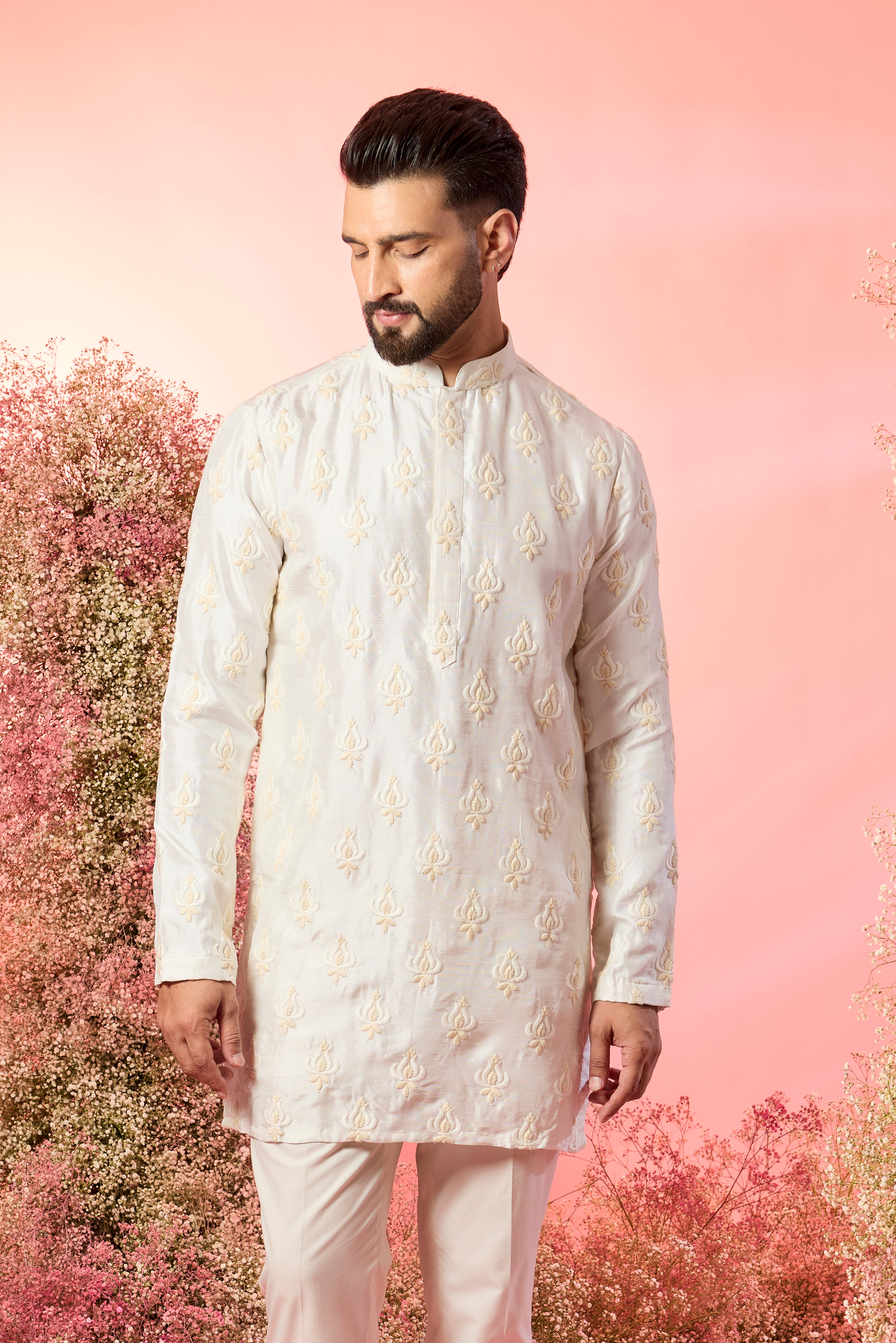 Ivory short chikankari kurta with deliacte thread work