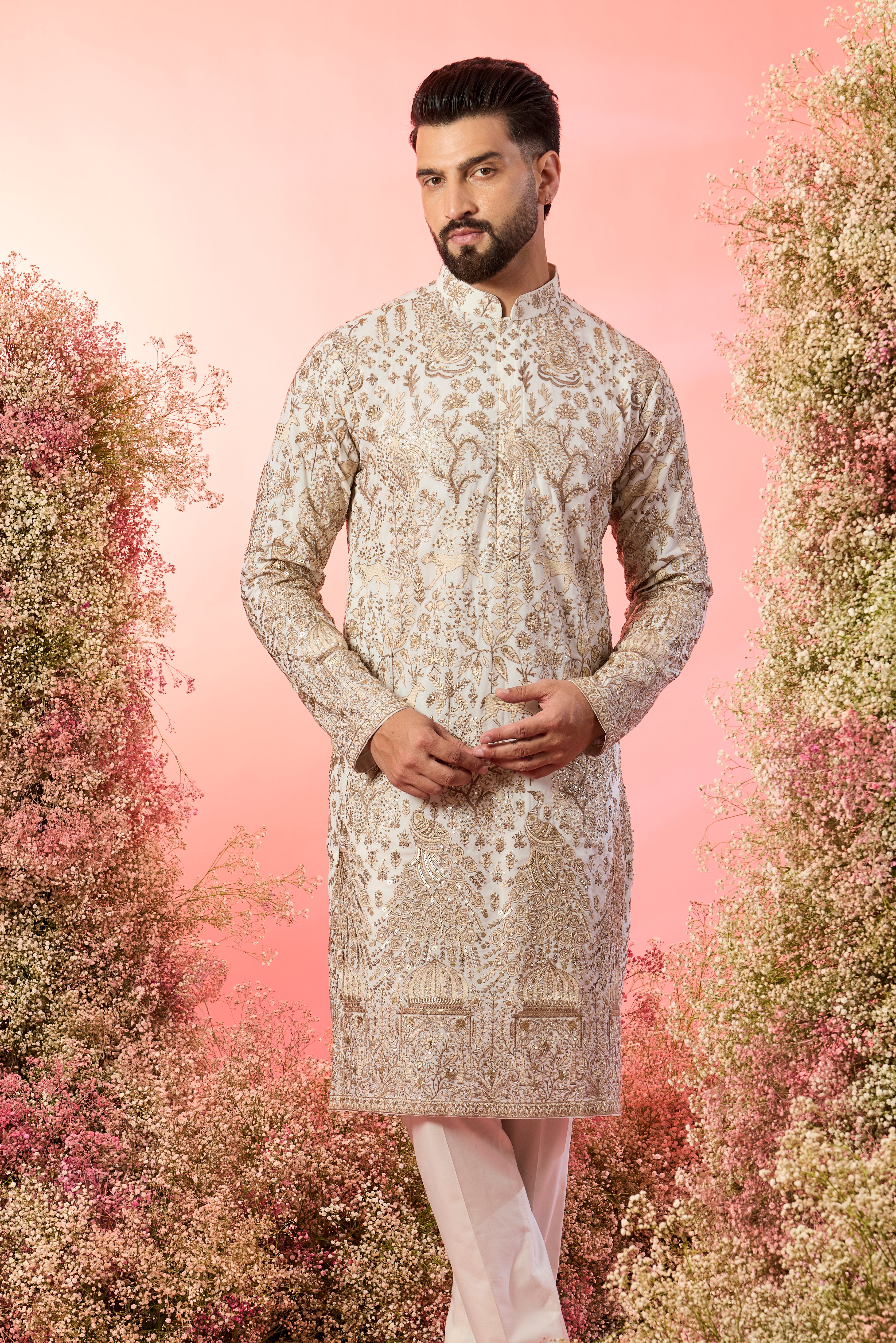 White zari kurta with inricate frlora and fauna figures