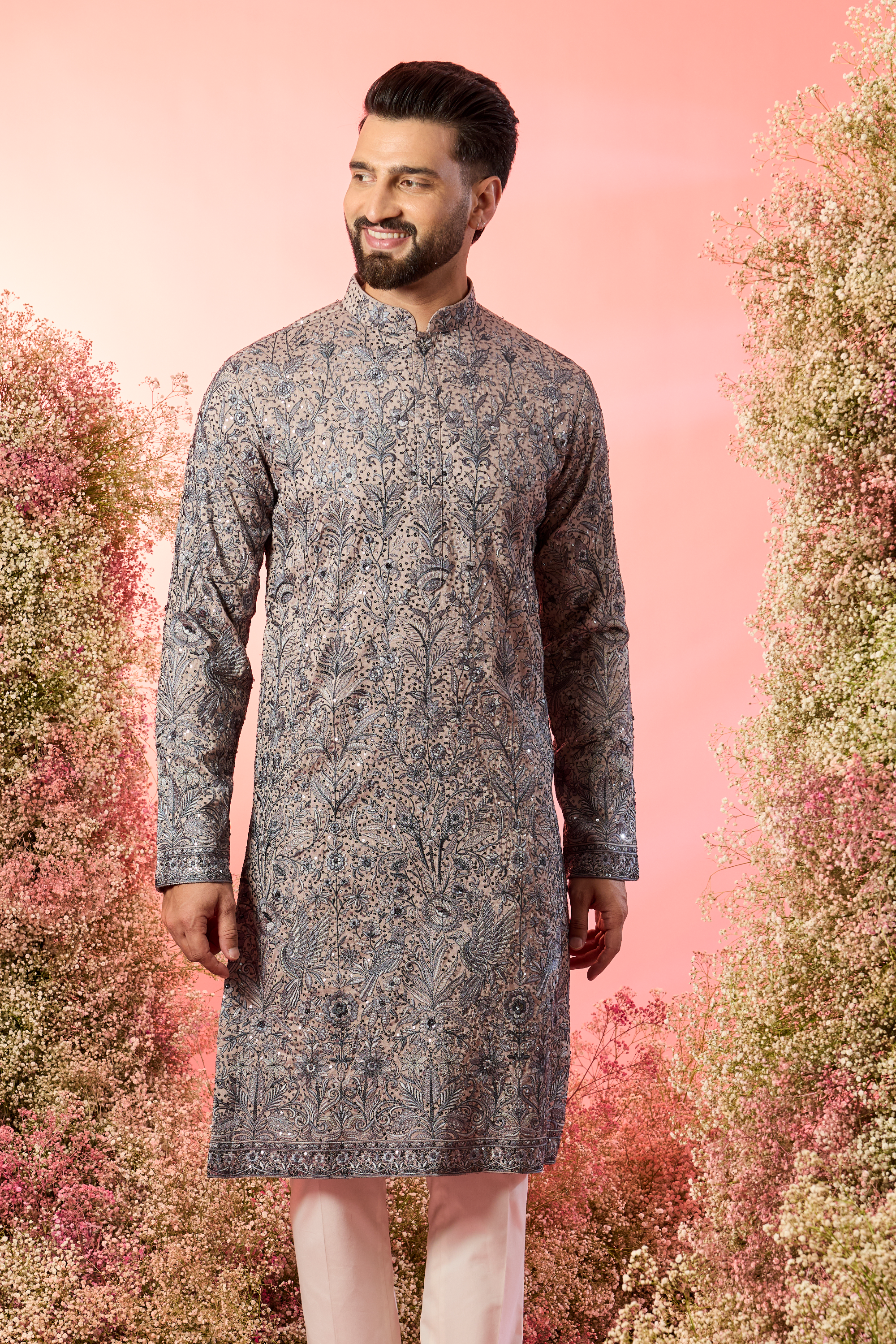 nude chikabkari kurta with intricate flora and fauna embroidery with blue thread work