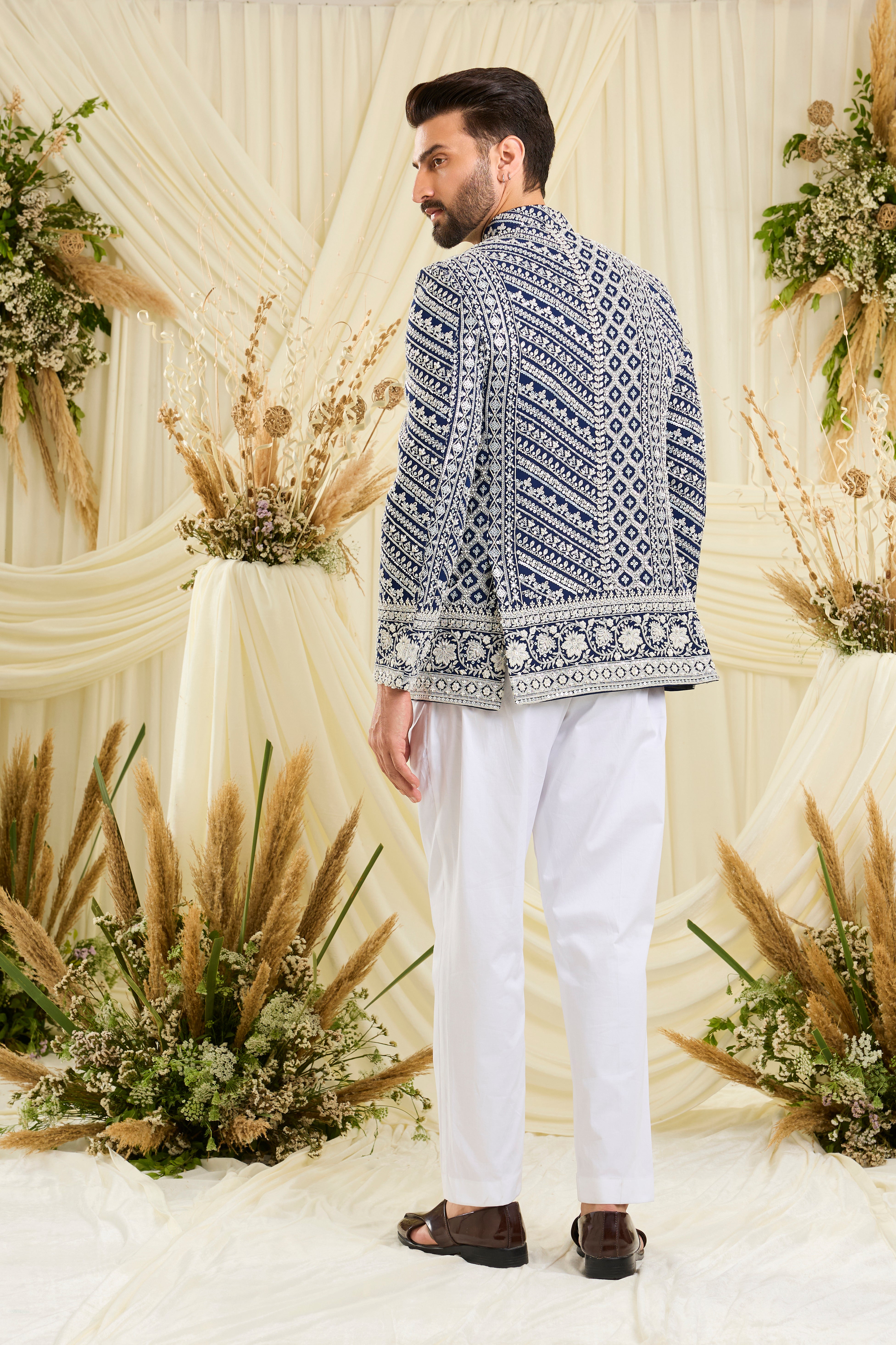 Royal blue bandgala with intricate white cut dana work and delicate sequins, crafted for a bold, ultra-luxurious statement.