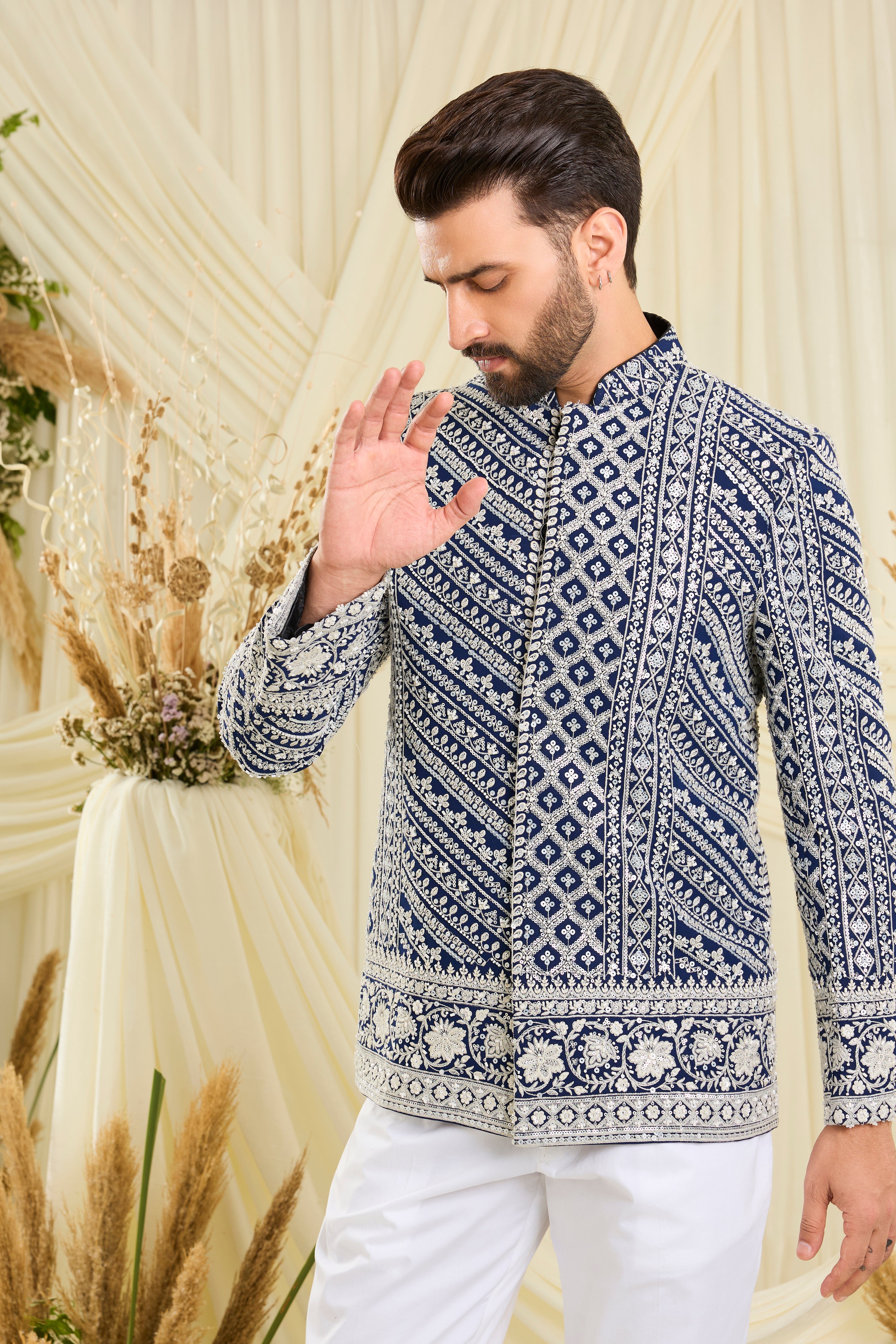 Royal blue bandgala with intricate white cut dana work and delicate sequins, crafted for a bold, ultra-luxurious statement.