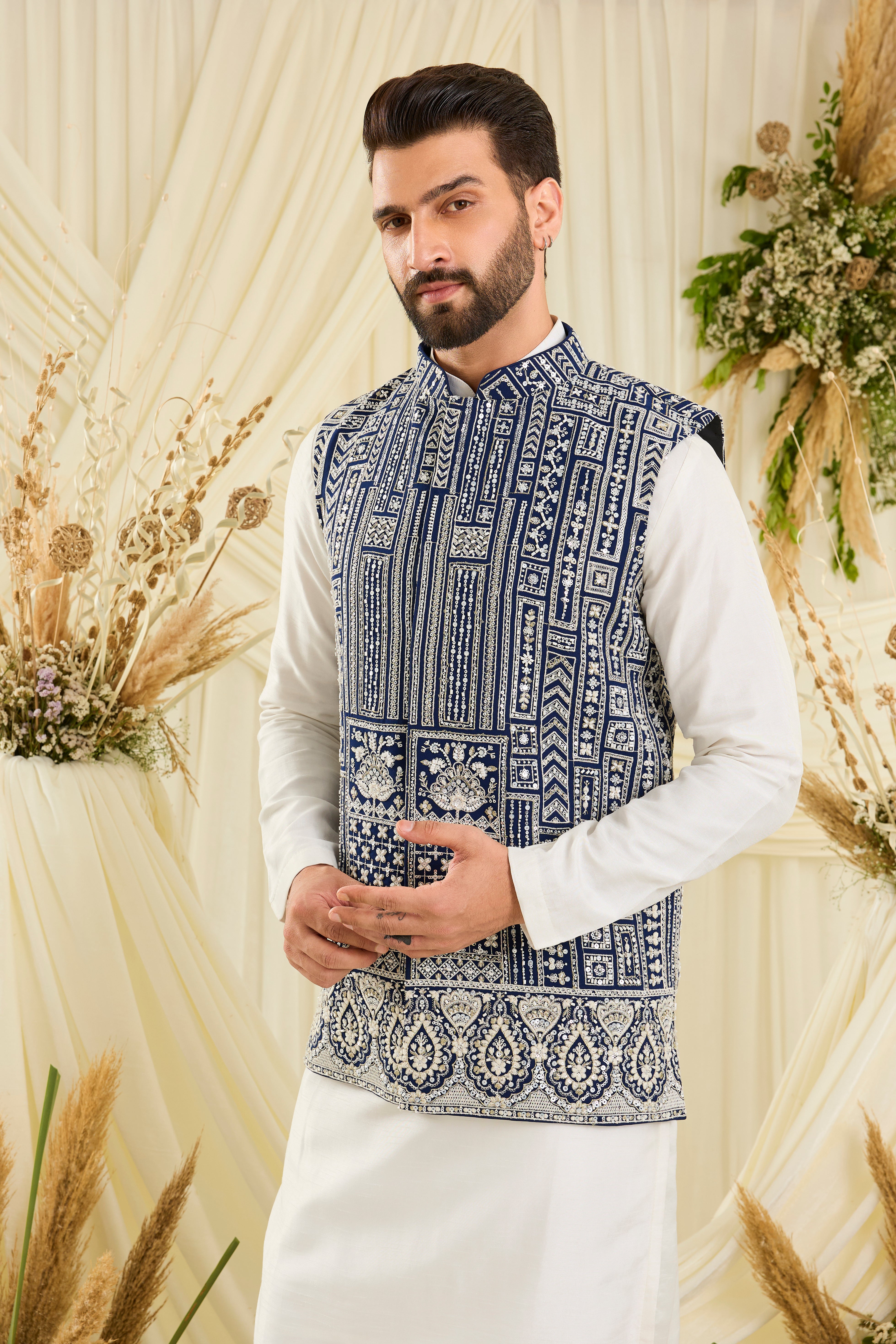 Royal blue nehru jacket with intricate white cut dana work and delicate sequins, crafted for a bold, ultra-luxurious statement.