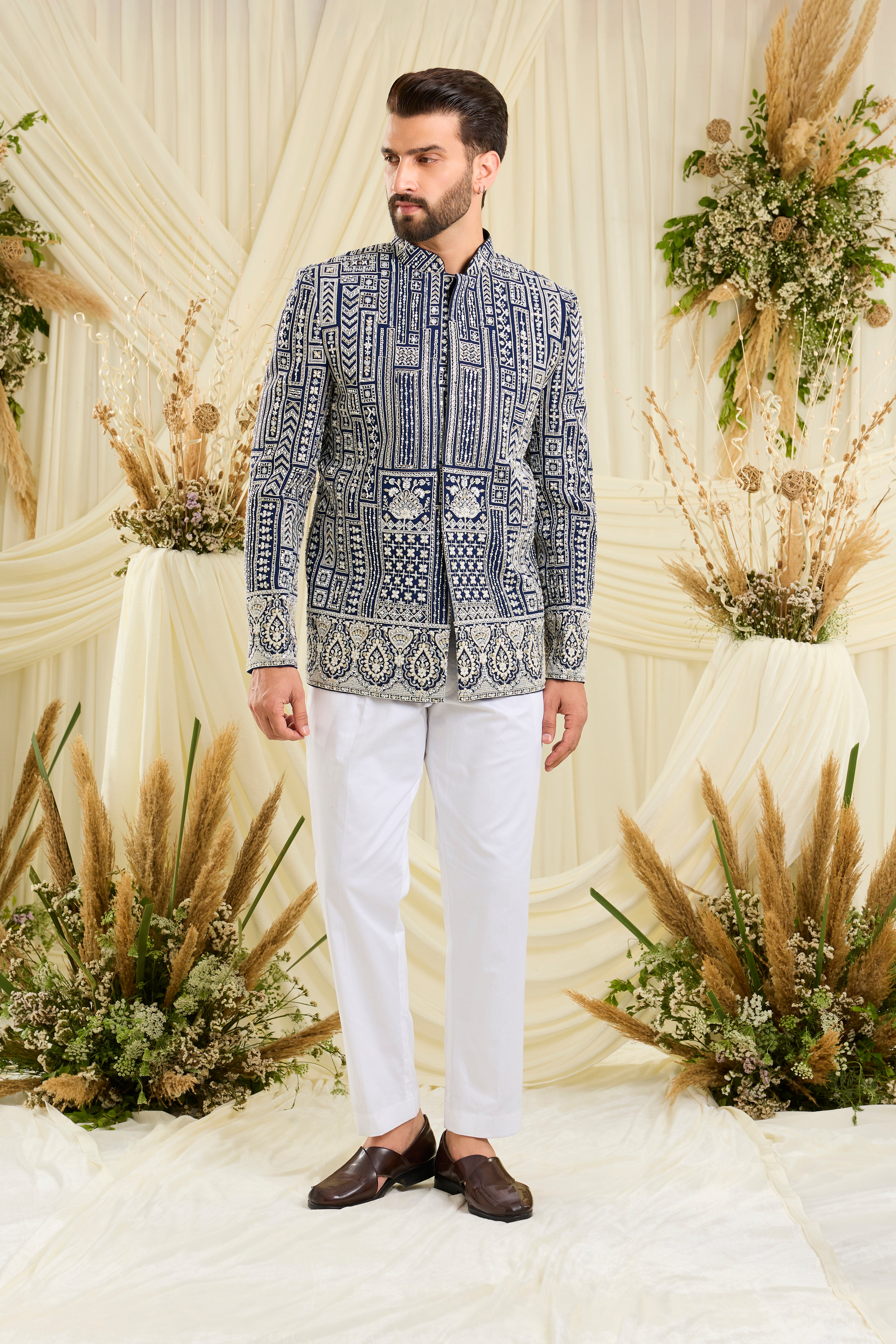 Royal blue bandgala with intricate white cut dana work and delicate sequins, crafted for a bold, ultra-luxurious statement.