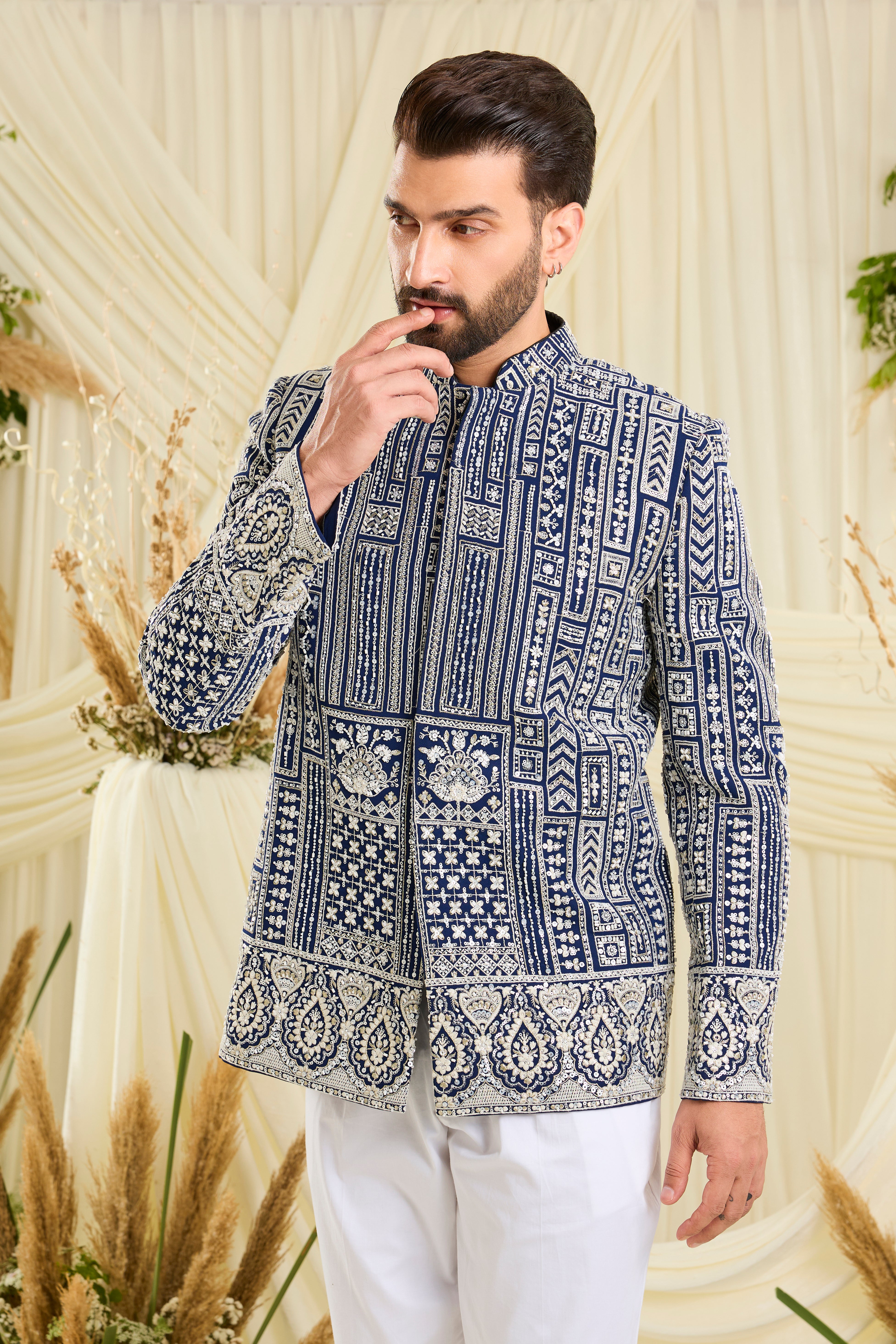 Royal blue bandgala with intricate white cut dana work and delicate sequins, crafted for a bold, ultra-luxurious statement.