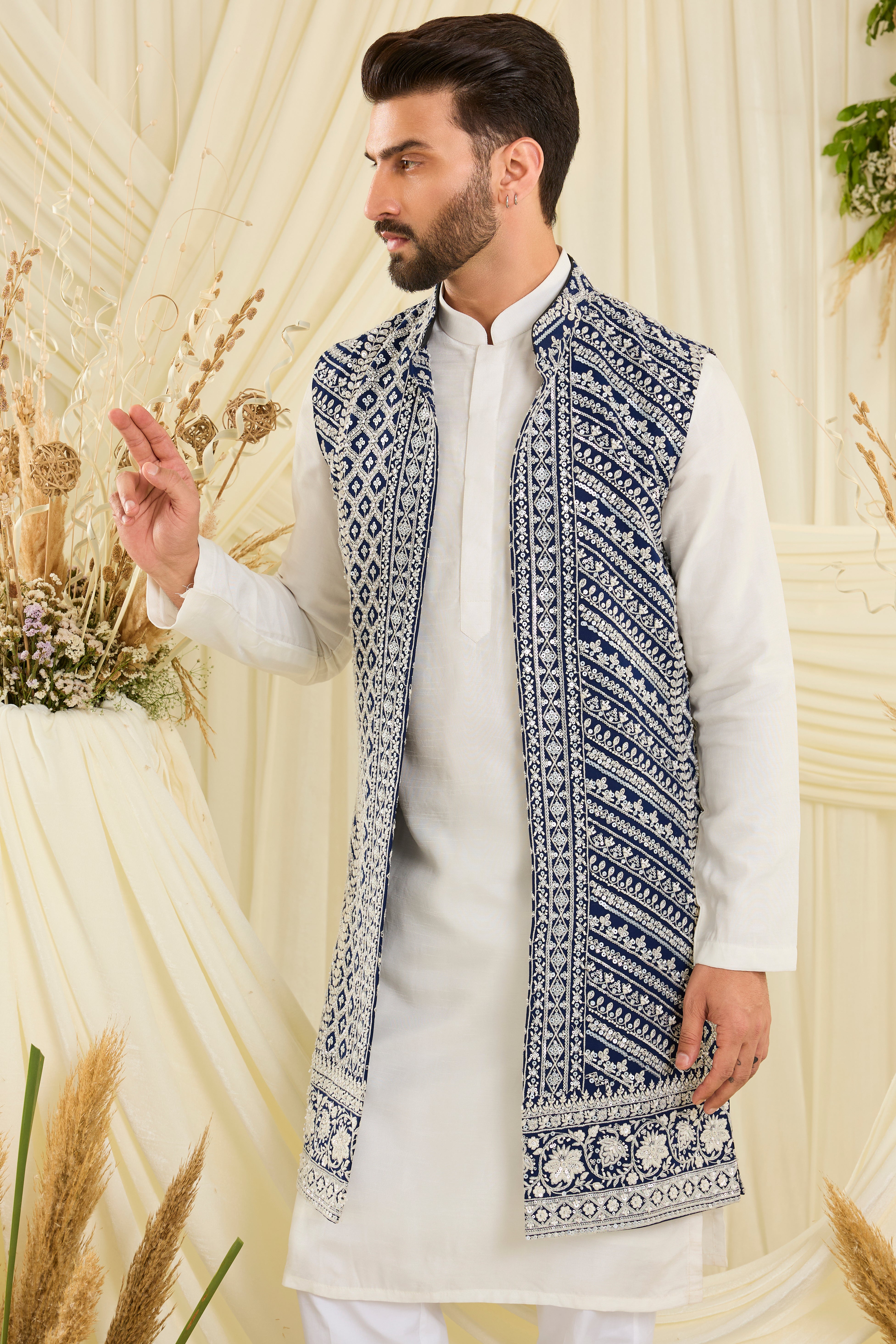 Royal blue long open jacket with intricate white cut dana work and delicate sequins, crafted for a bold, ultra-luxurious statement.