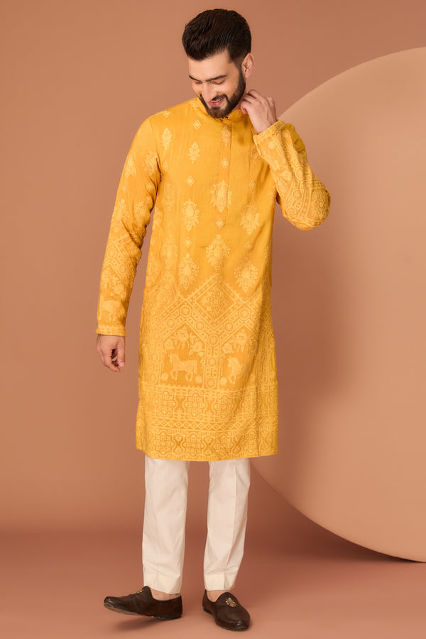 Mustard chikankari kurta with intricate fiigure embroidery on the ghera - kasbahmen