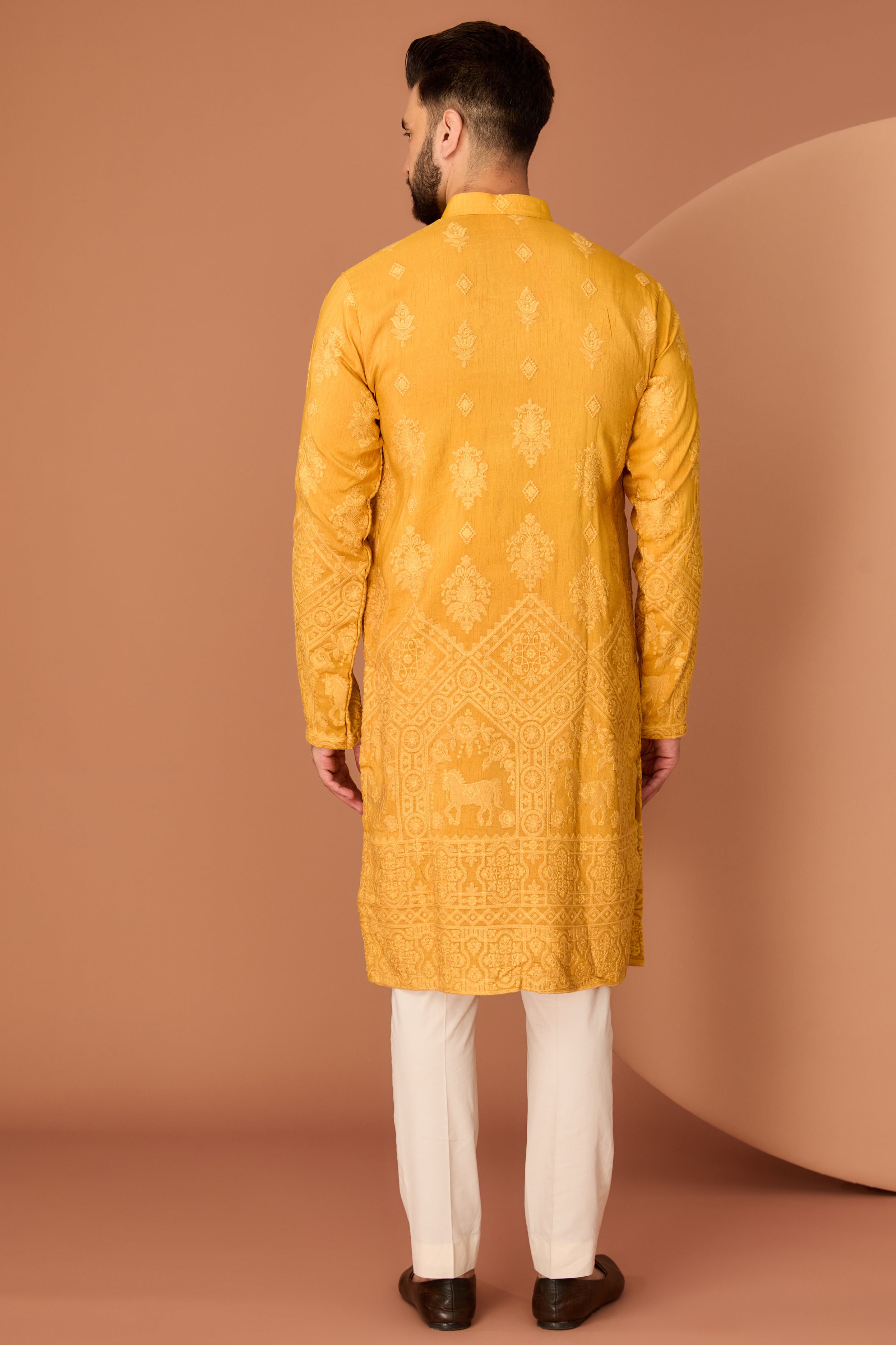 Mustard chikankari kurta with intricate fiigure embroidery on the ghera - kasbahmen