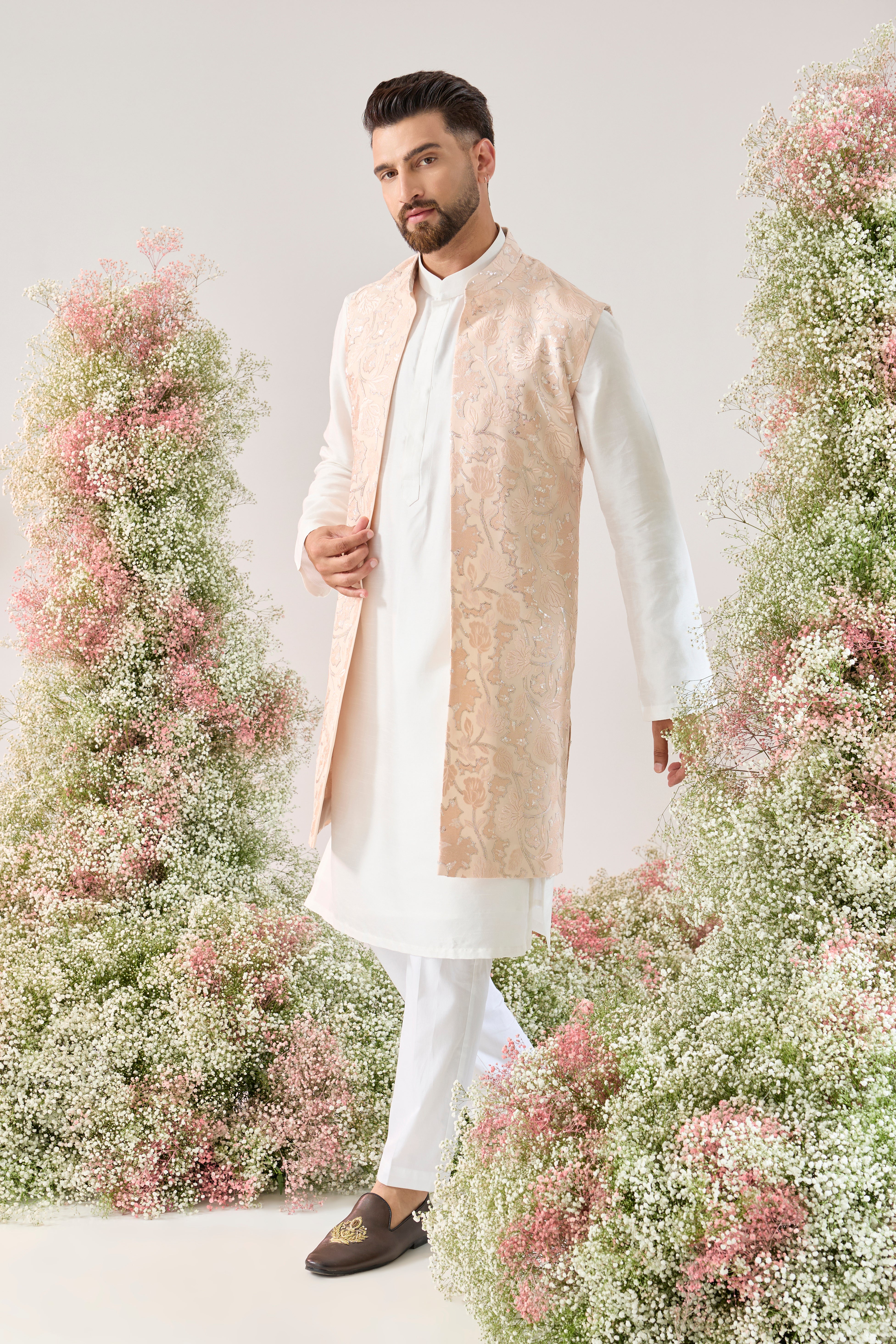 baby pink long open jacket with delicate floral pattern and sequin detaiing
