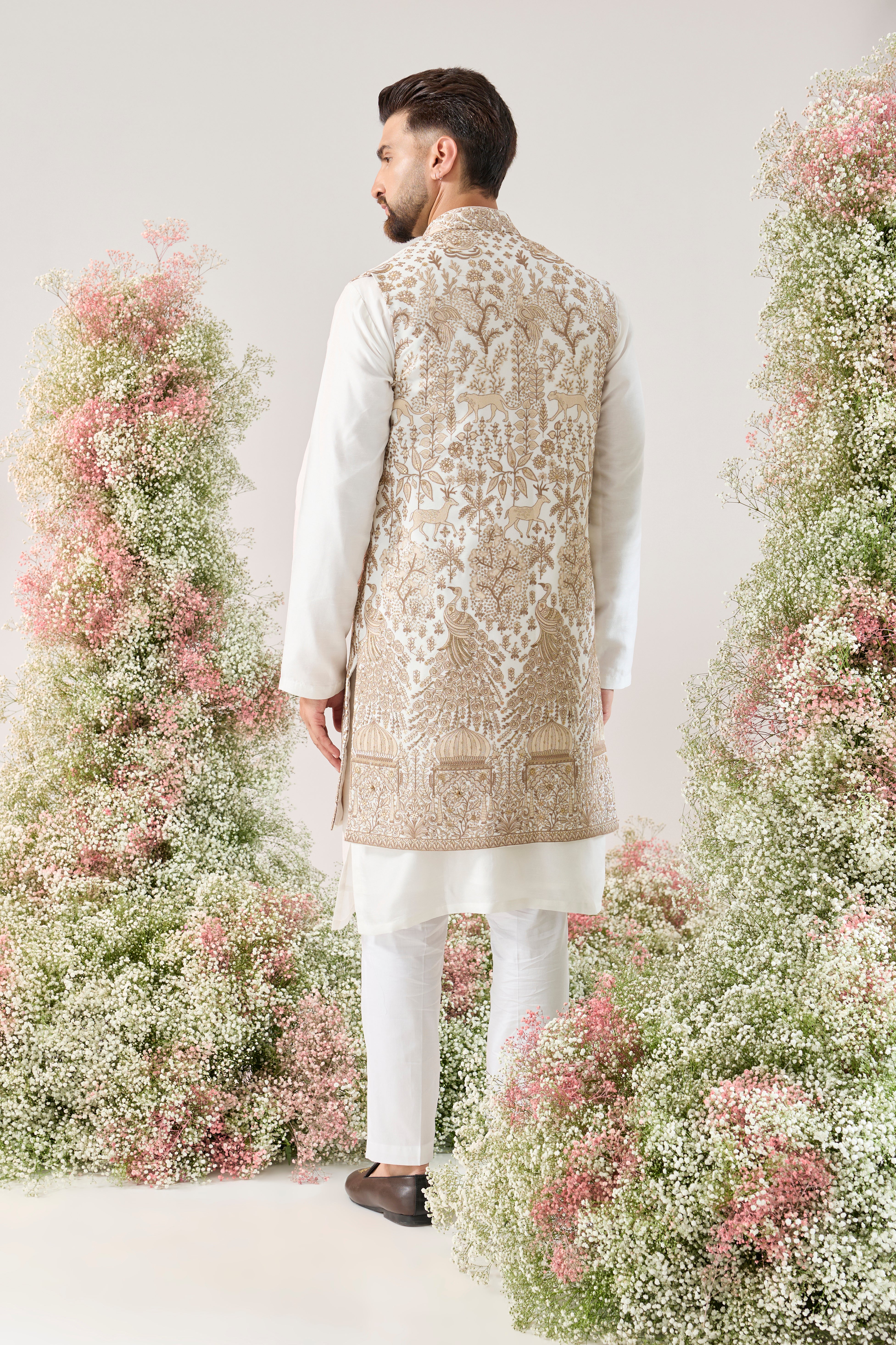 white rotal heritage long open jacket with deatiled flora and fauna figures