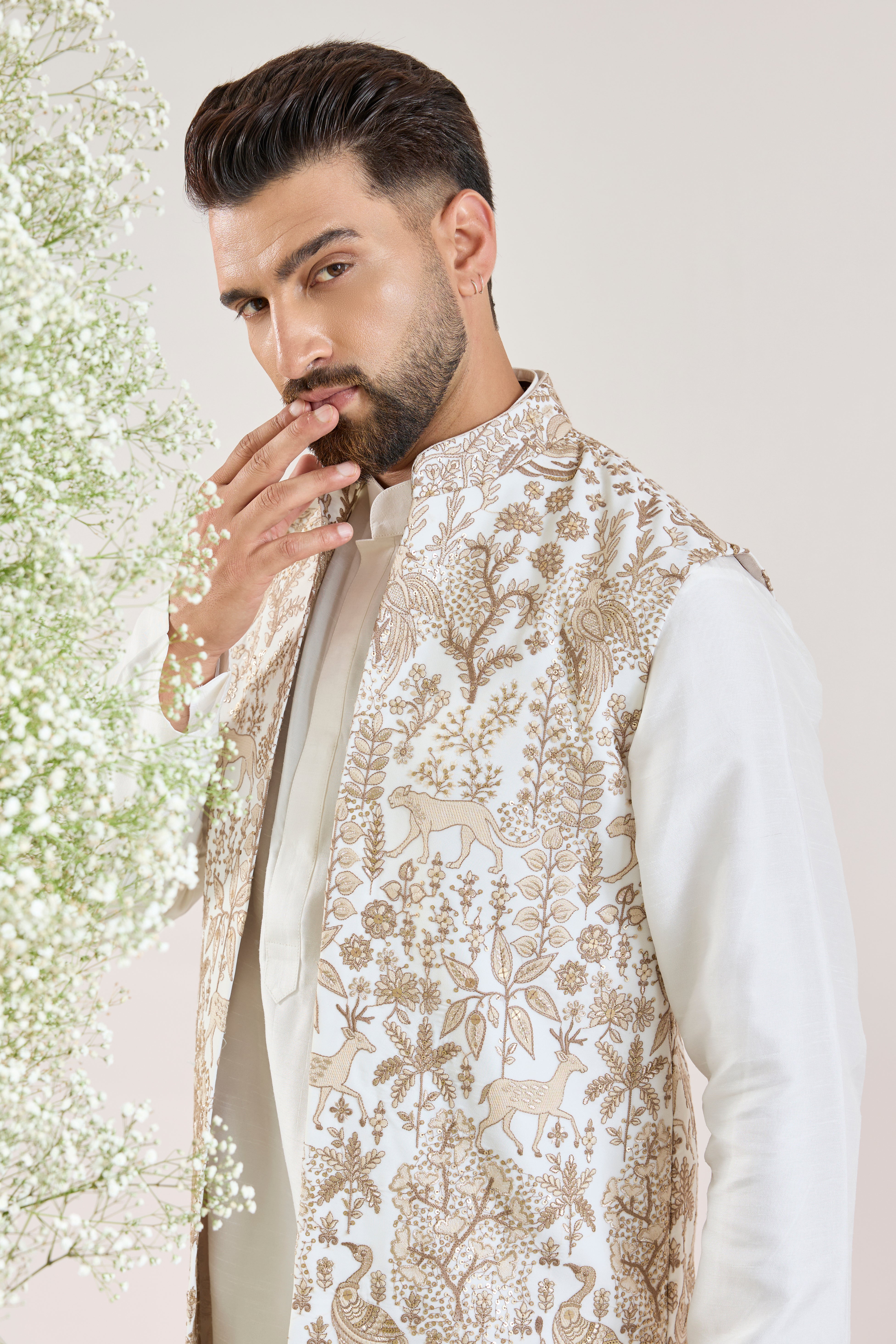 white rotal heritage long open jacket with deatiled flora and fauna figures
