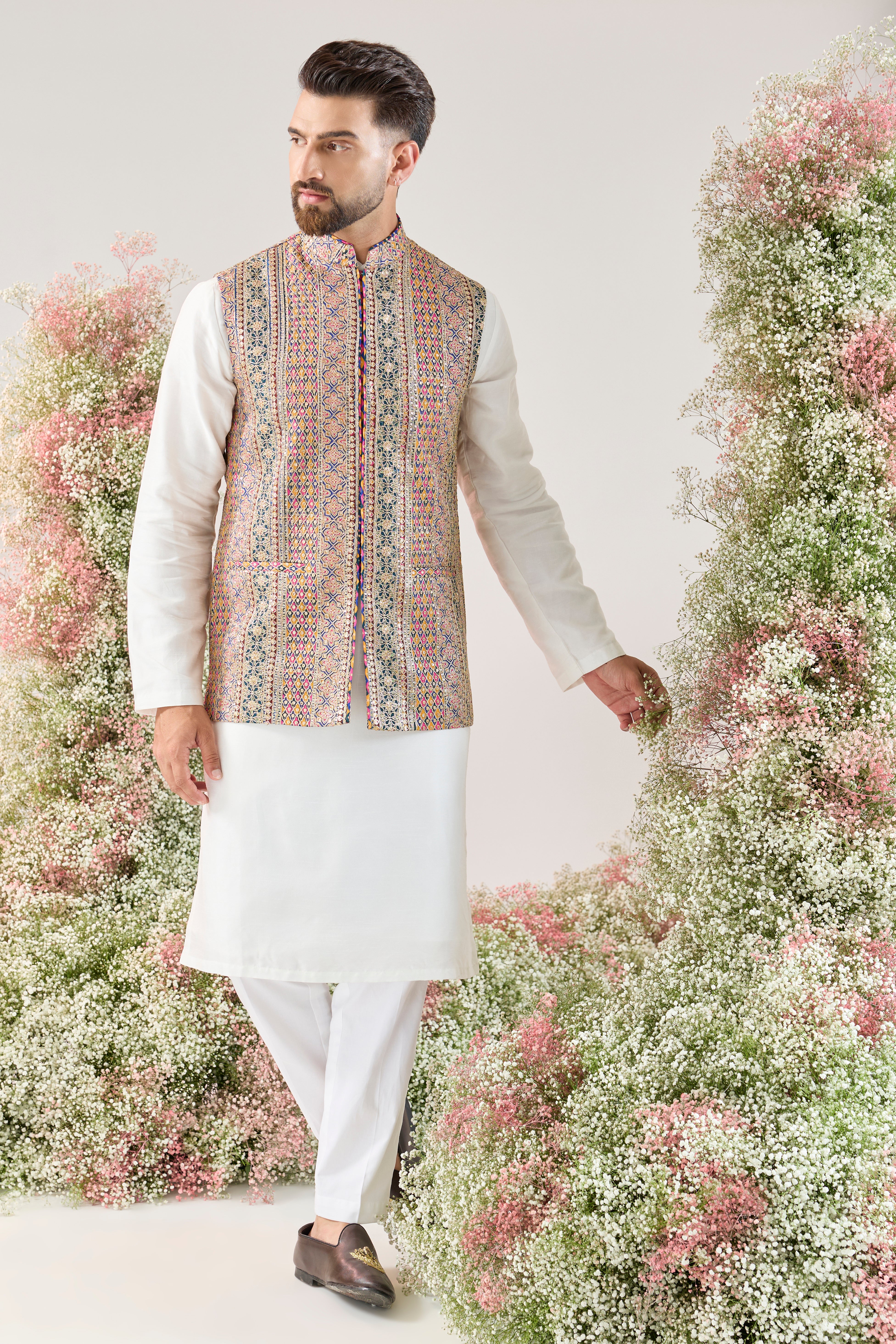 Zari Grandeur: nehru Jacket with a multi coloured pattern and Golden Embellishments