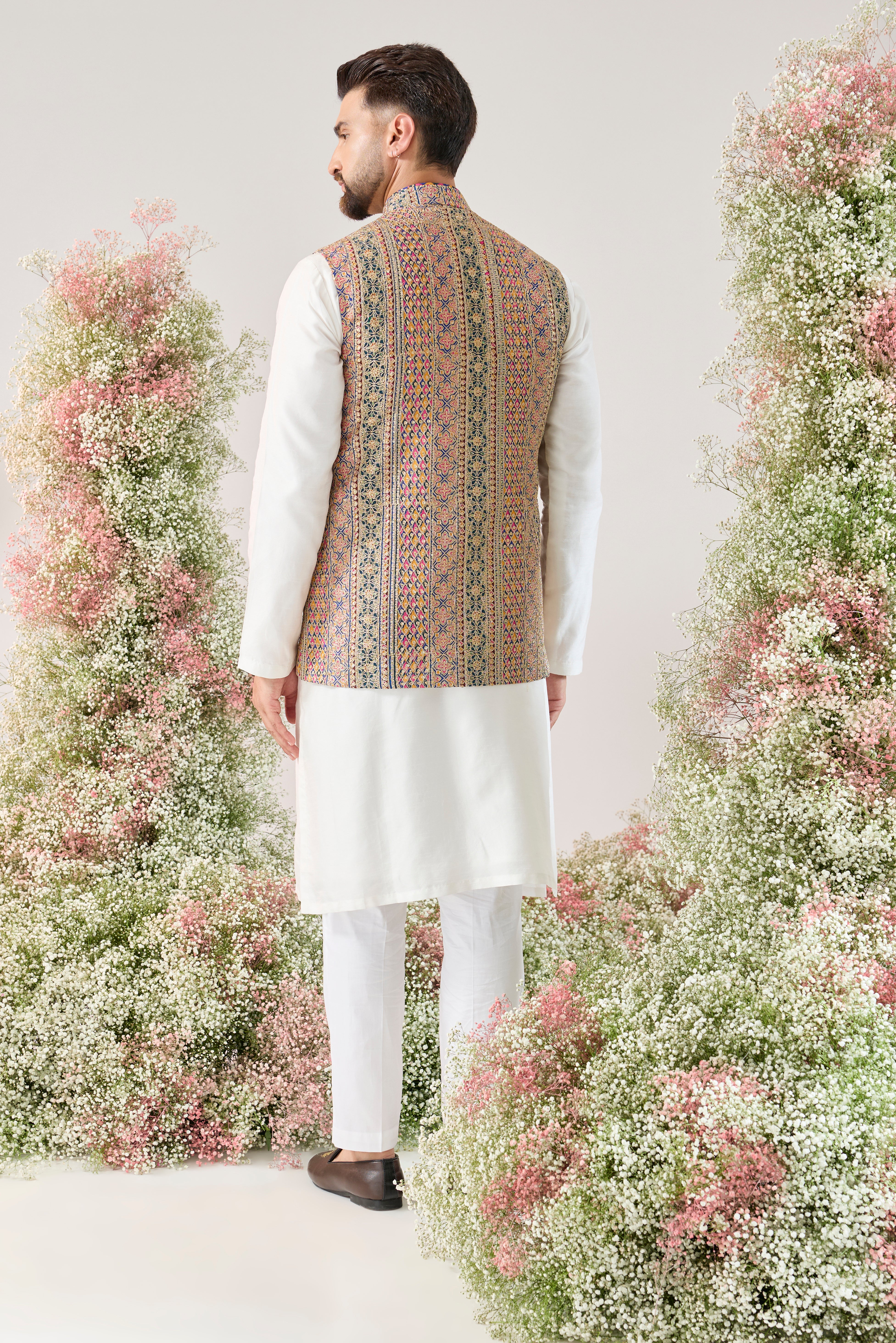 Zari Grandeur: nehru Jacket with a multi coloured pattern and Golden Embellishments