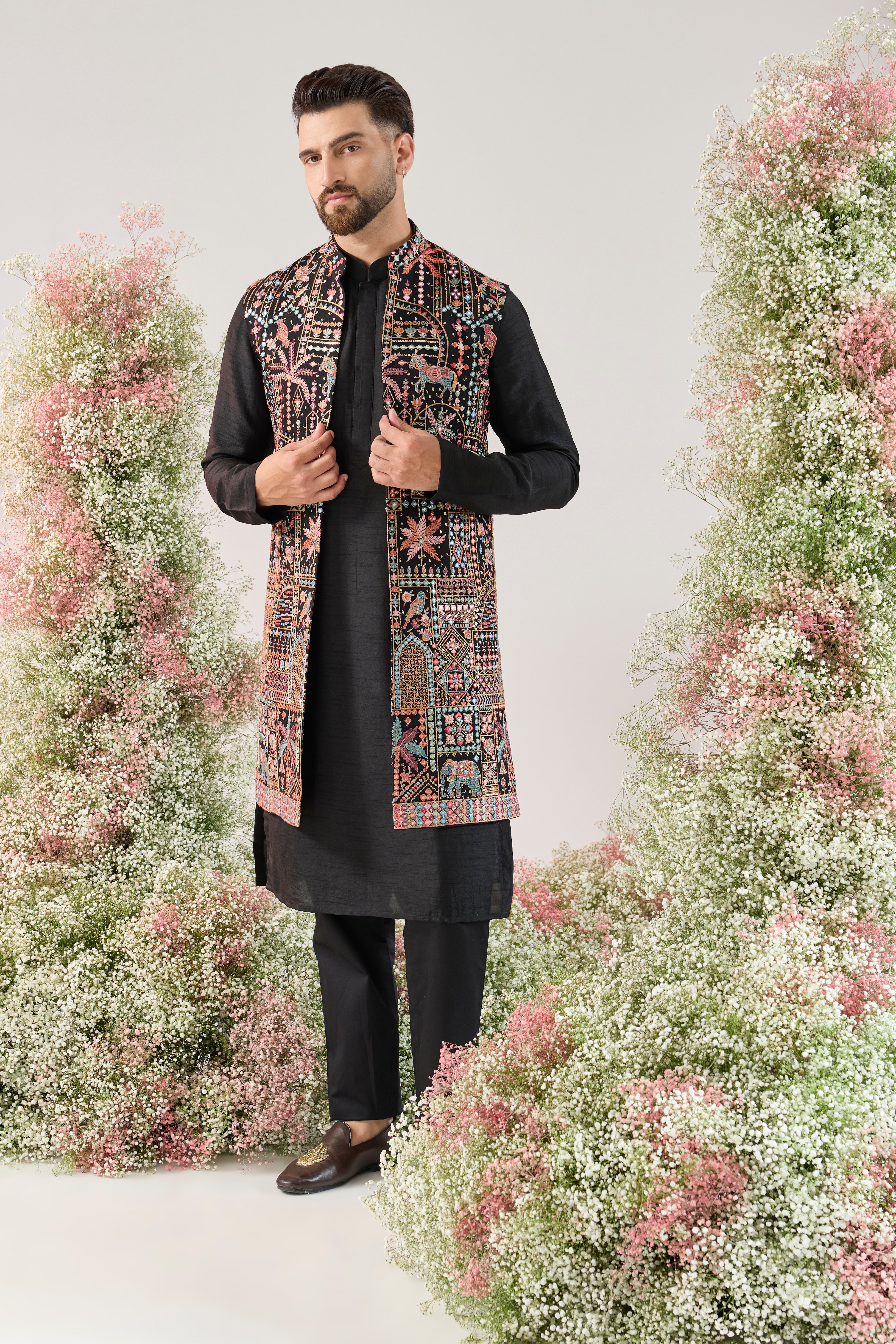 black long open jacket with deatiled flora - fauna motifs and multi coloured threadwork