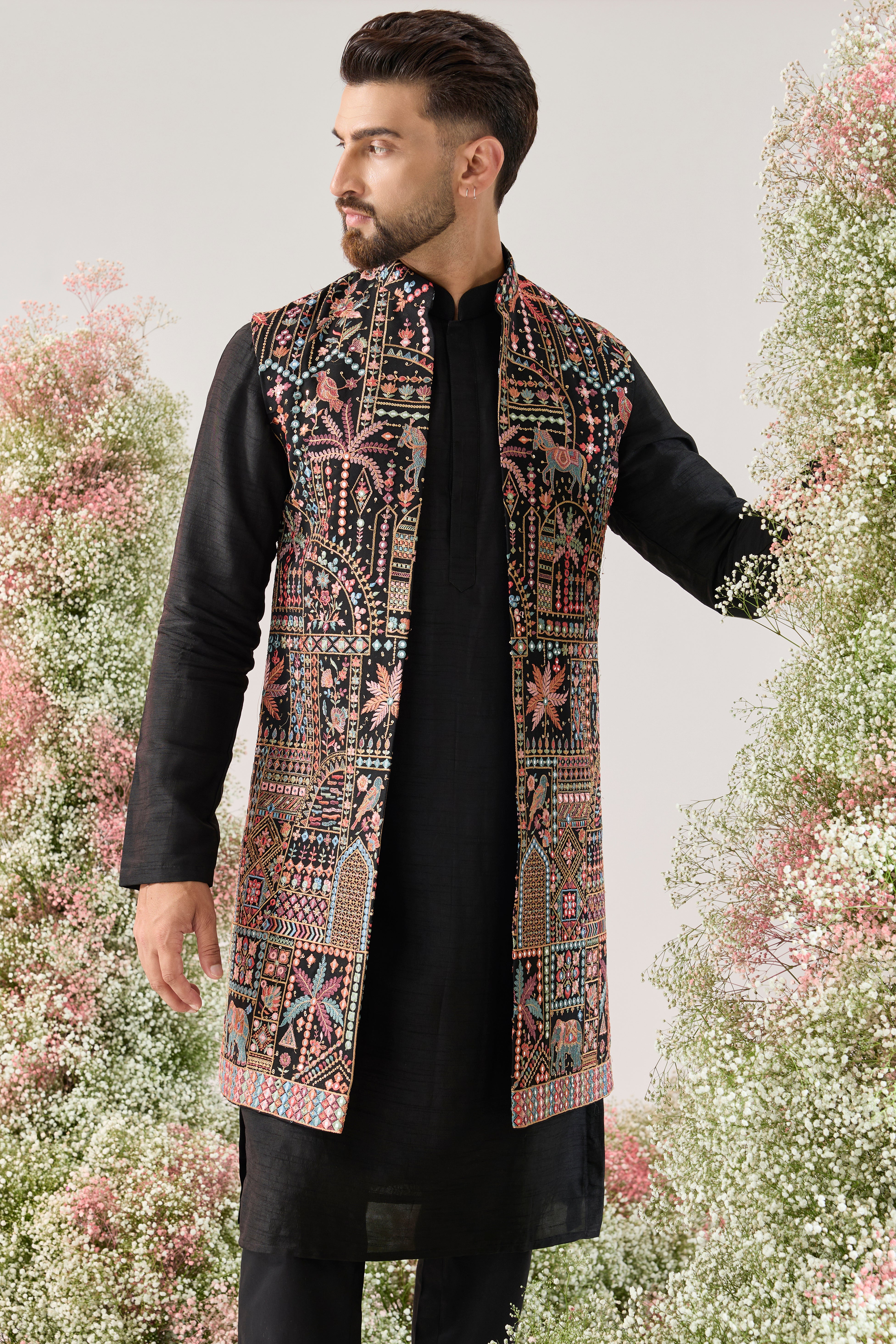 black long open jacket with deatiled flora - fauna motifs and multi coloured threadwork