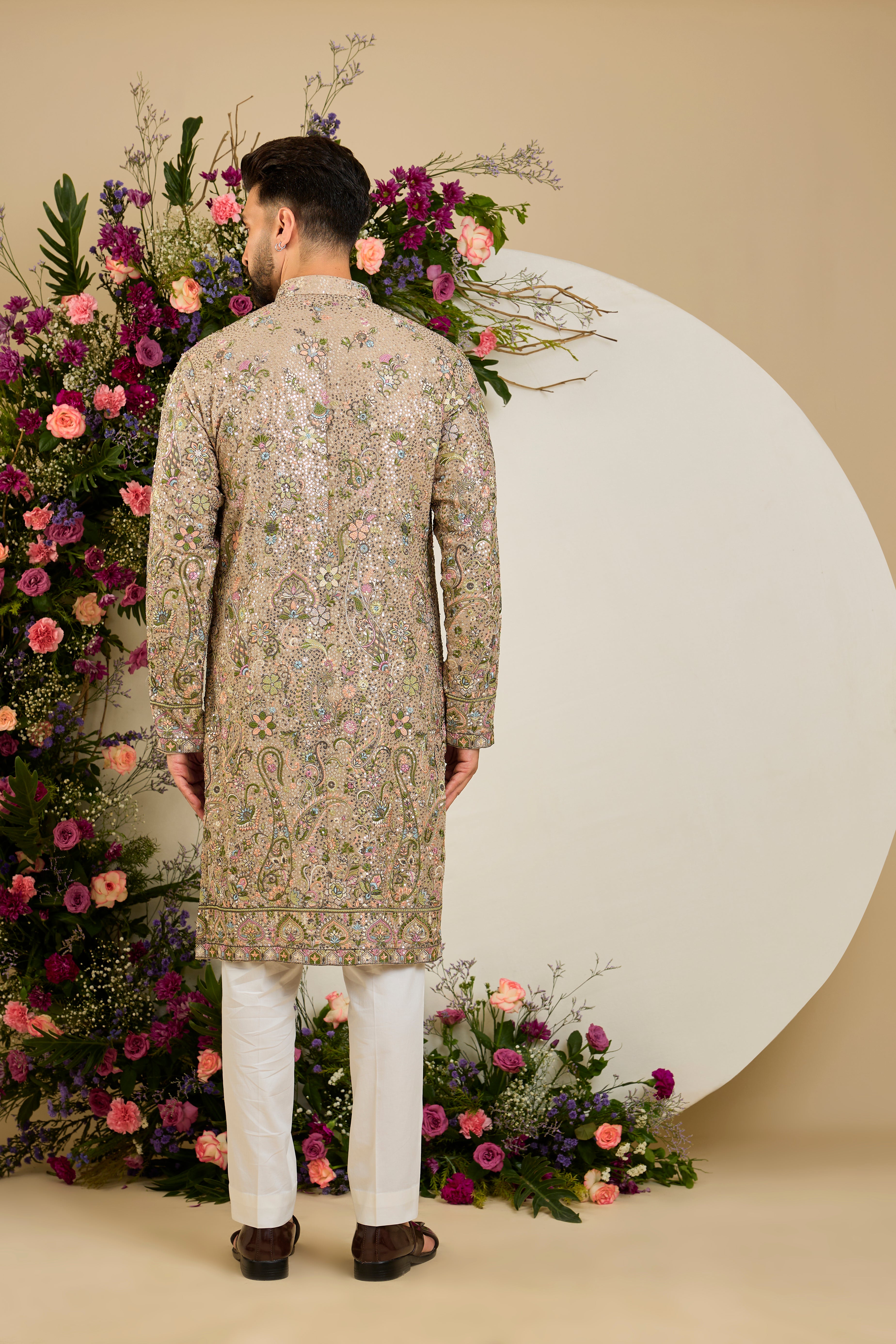 Heavy sequined  mouse shaded kurta with intricate multi-coloured thread embroidery, tailored for distinguished celebrations and timeless elegance.