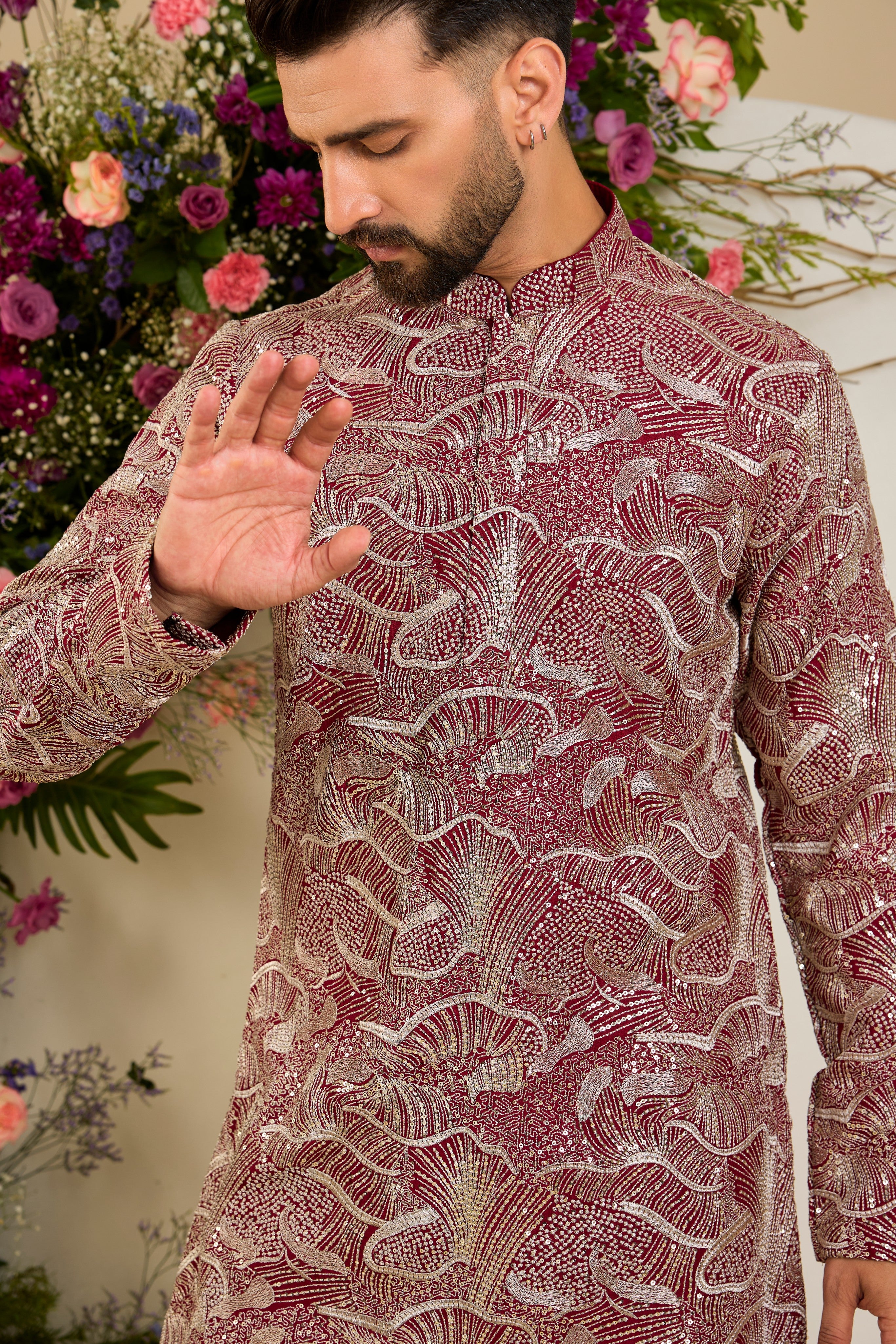 The Halcyon Celestial Kurta -Tailored in an opulent imperial maroon, this short kurta features an all-over sequin finish enriched with lavish zari detailing.