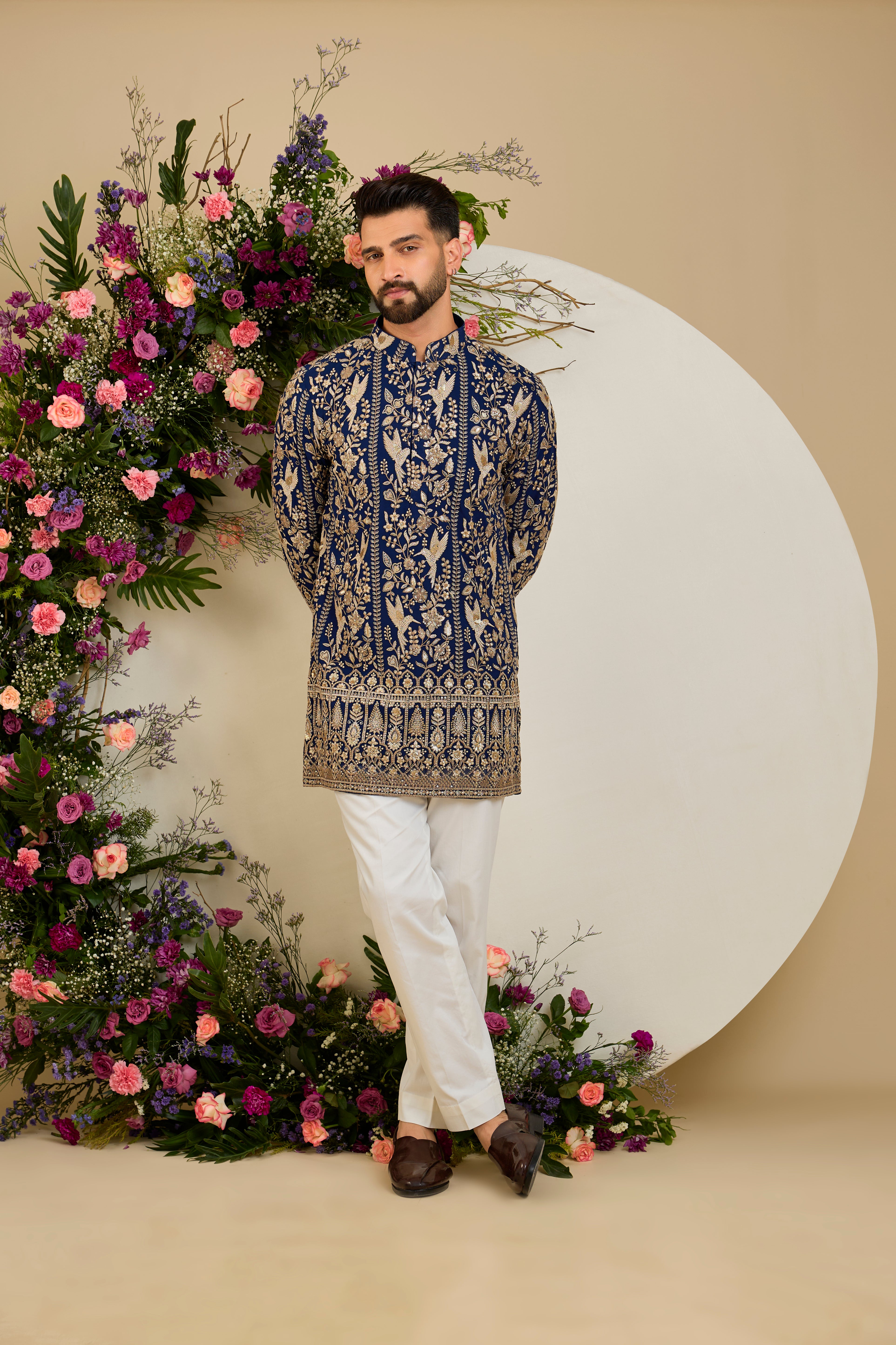 Royal blue flora & fauna short kurta with intricate sequin and zari detailing, tailored for timeless elegance and distinguished celebrations.