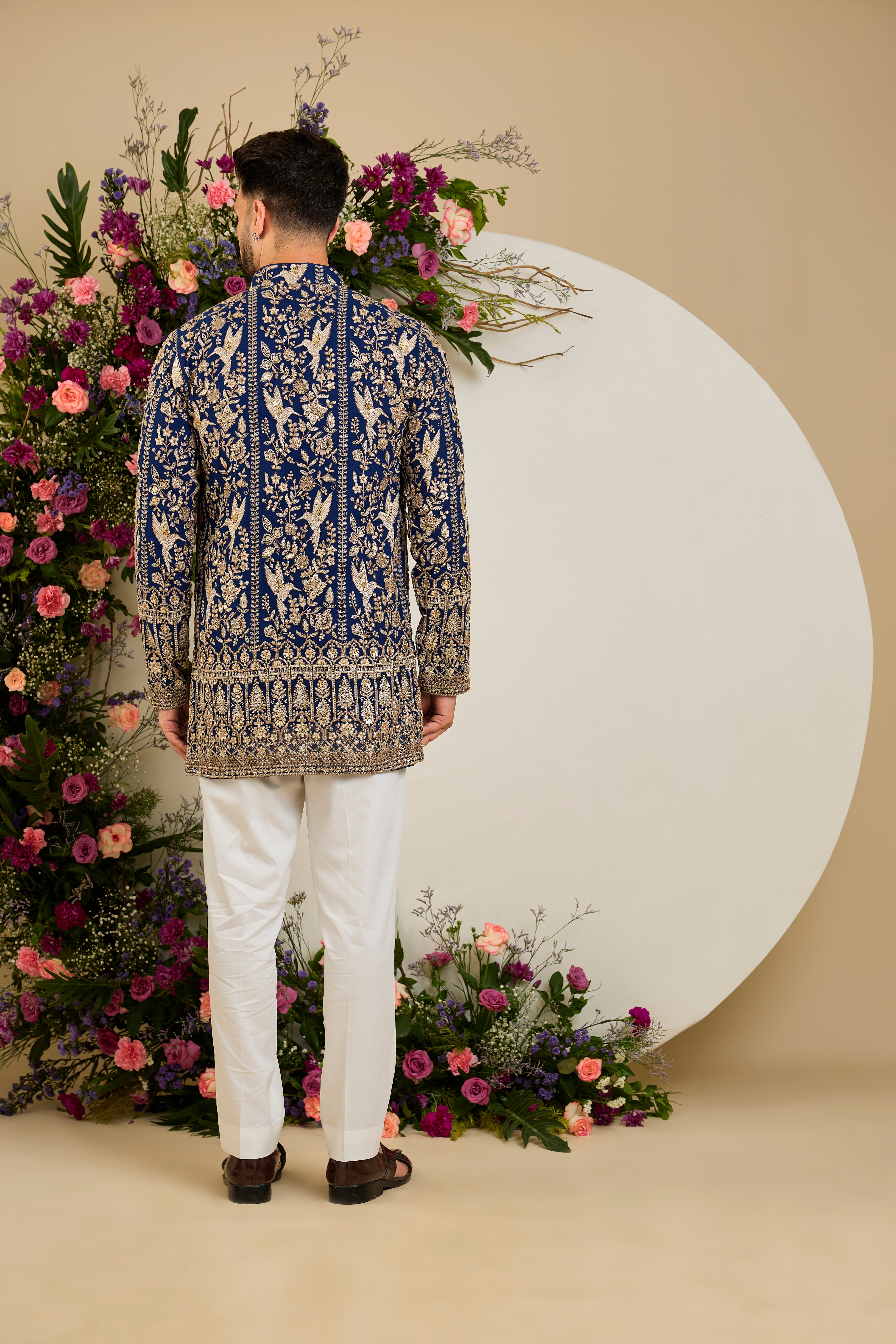 Royal blue flora & fauna short kurta with intricate sequin and zari detailing, tailored for timeless elegance and distinguished celebrations.