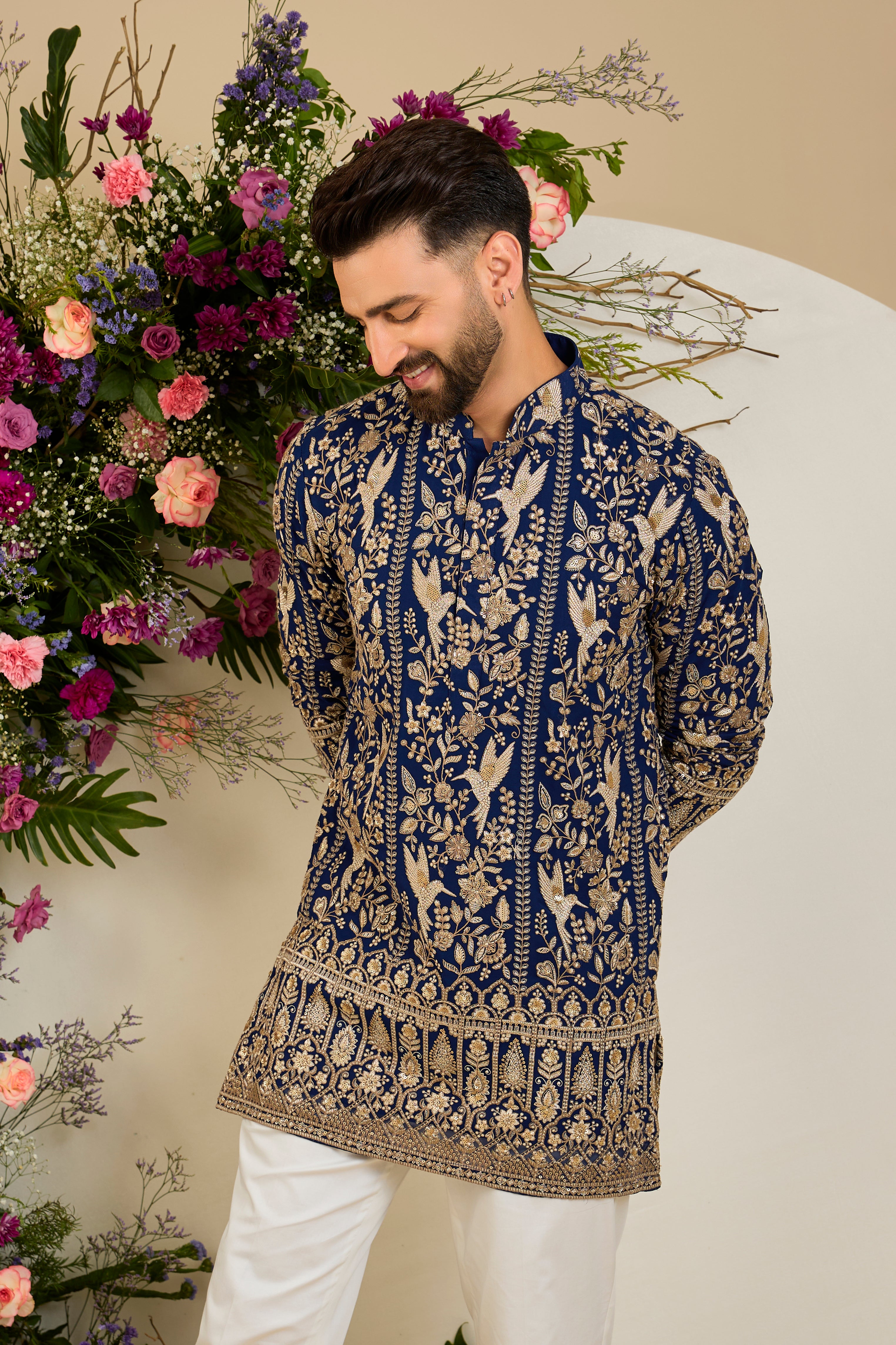 Royal blue flora & fauna short kurta with intricate sequin and zari detailing, tailored for timeless elegance and distinguished celebrations.