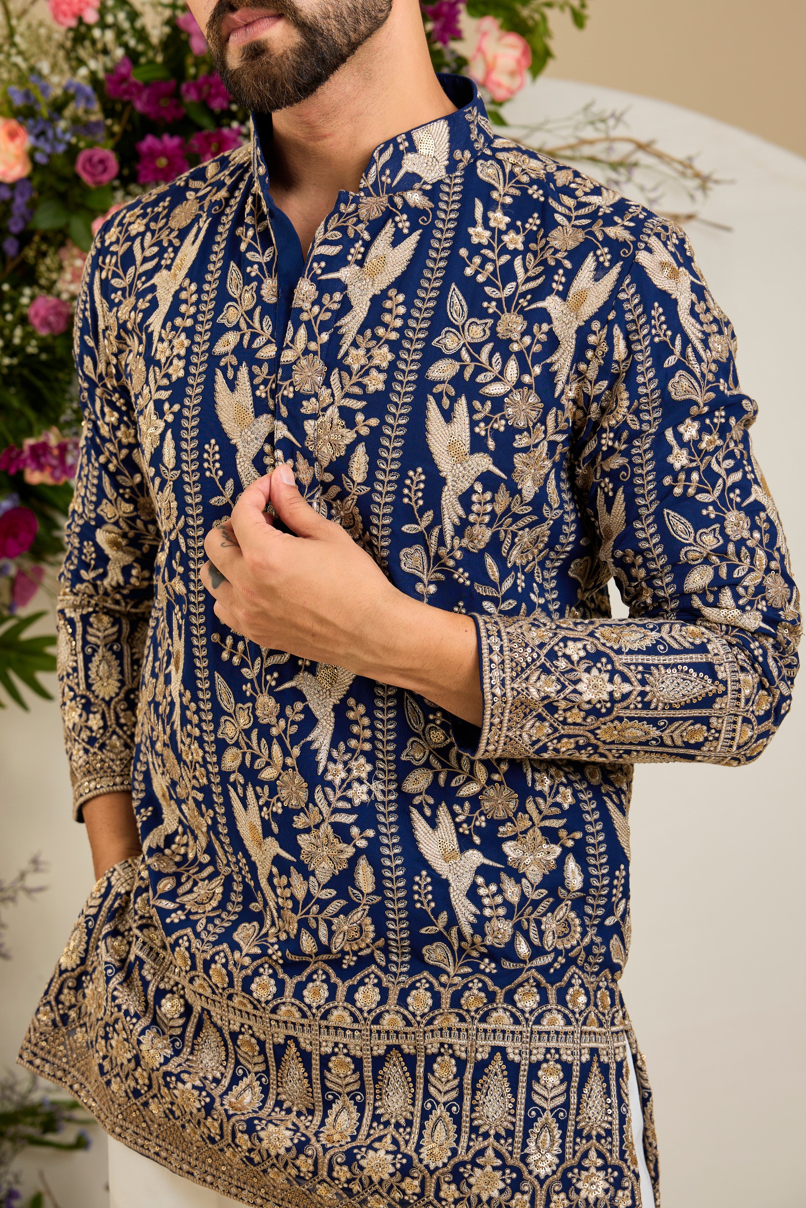 Royal blue flora & fauna short kurta with intricate sequin and zari detailing, tailored for timeless elegance and distinguished celebrations.