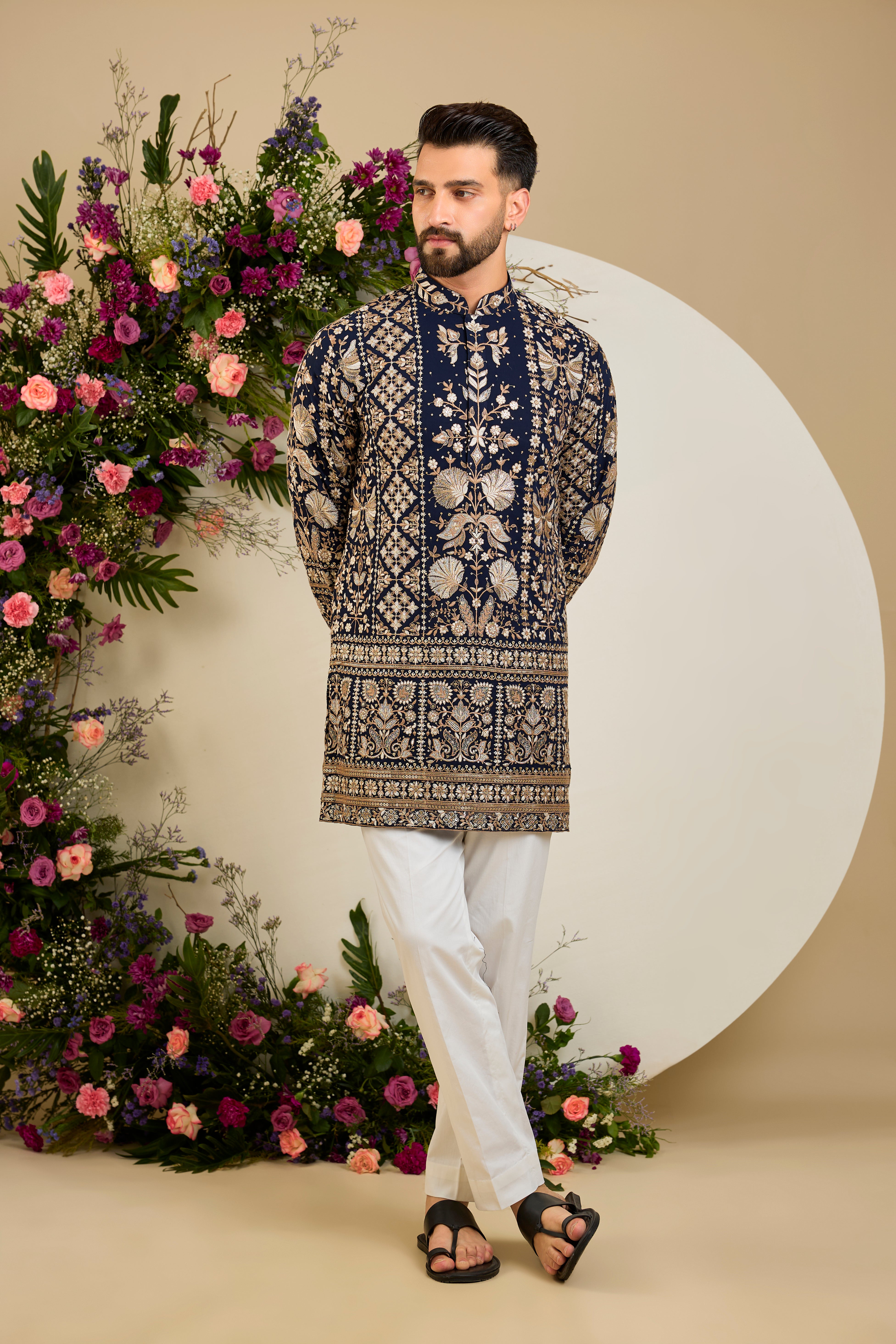 Navy blue floral short  kurta with intricate sequin and zari detailing, tailored for timeless elegance and distinguished celebrations.