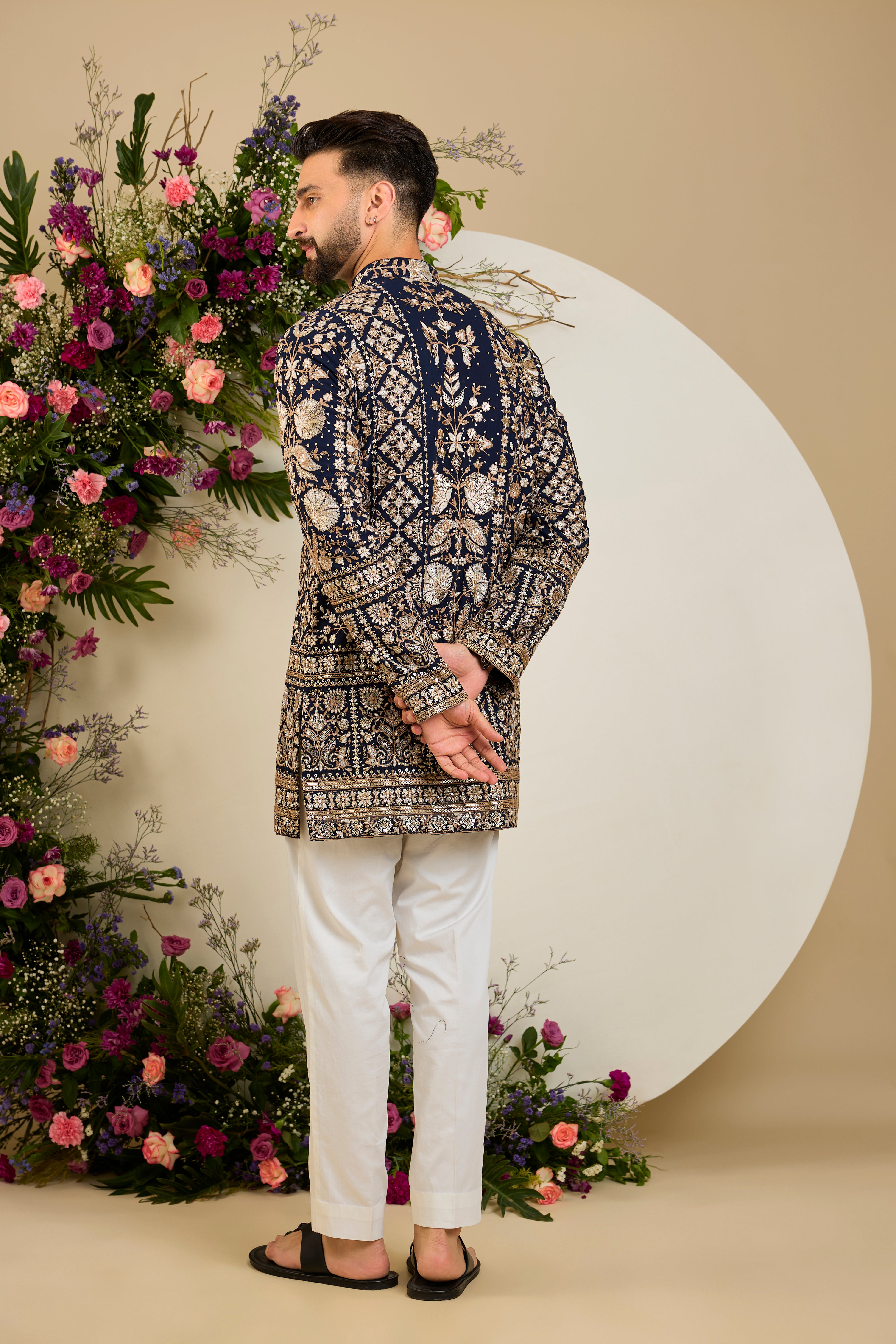 Navy blue floral short  kurta with intricate sequin and zari detailing, tailored for timeless elegance and distinguished celebrations.