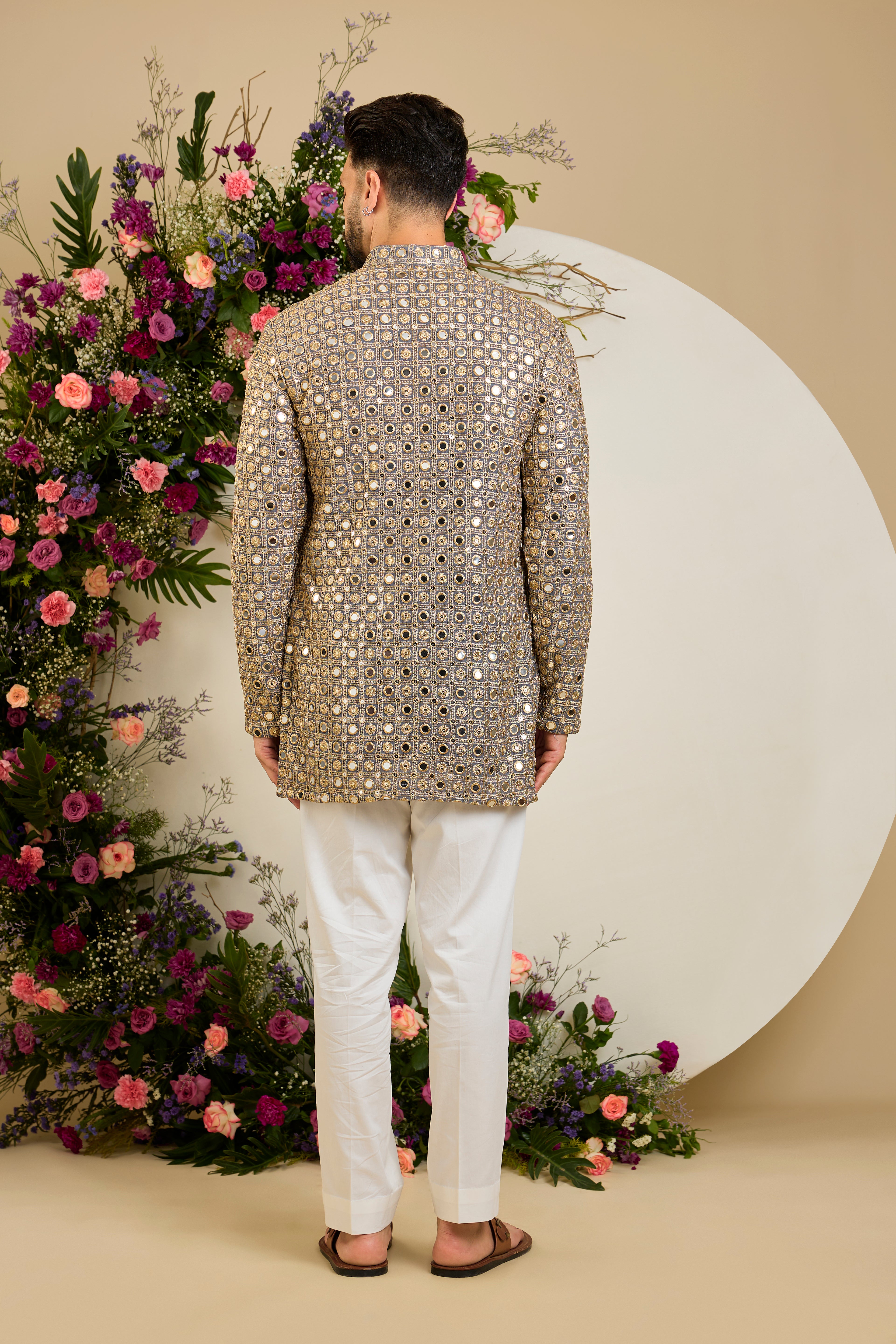 Sterling grey short mirror work kurta with  intricate golden zari embroidery for timeless festive elegance.