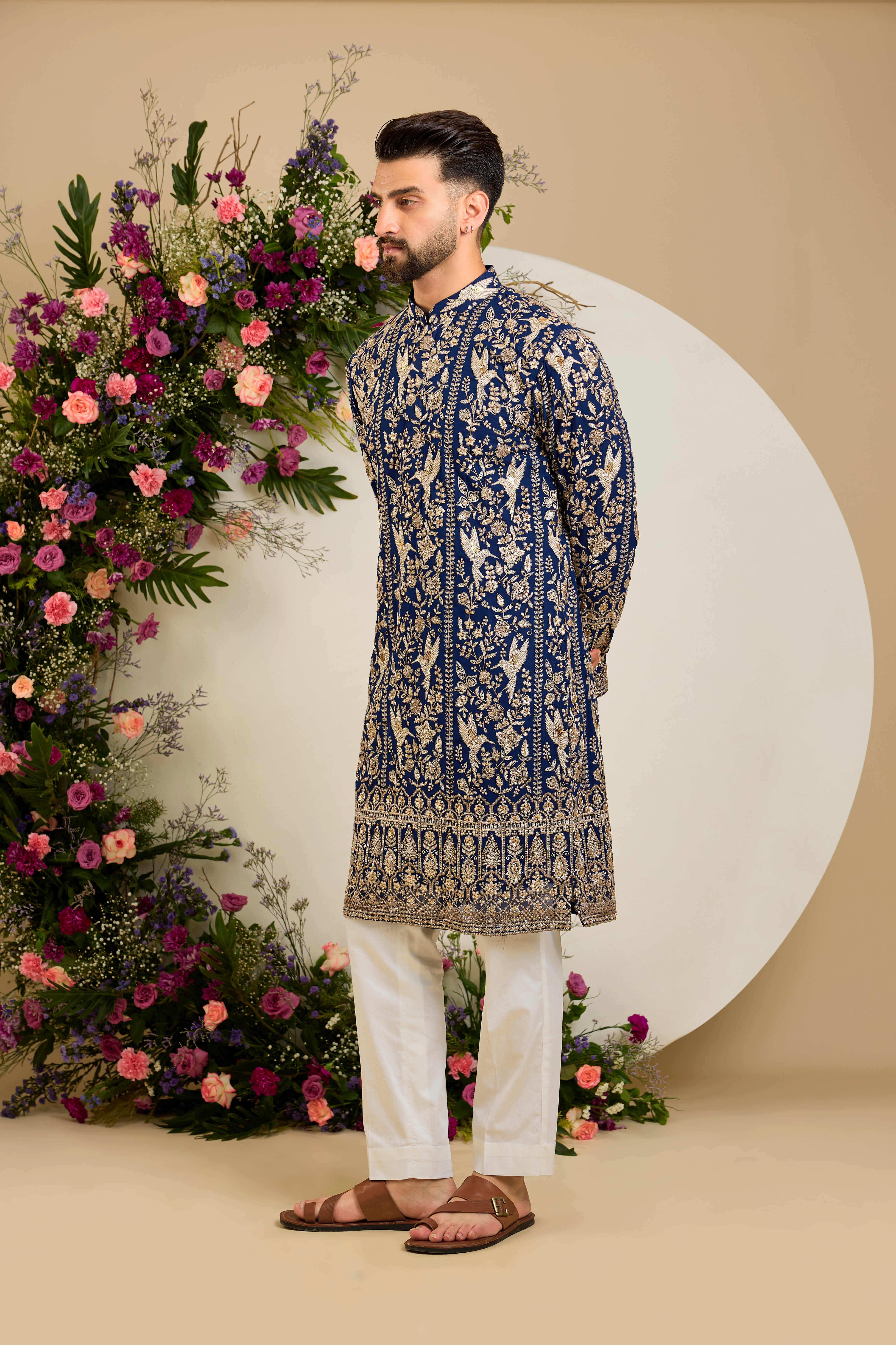Royal blue flora & fauna kurta with intricate sequin and zari detailing, tailored for timeless elegance and distinguished celebrations.