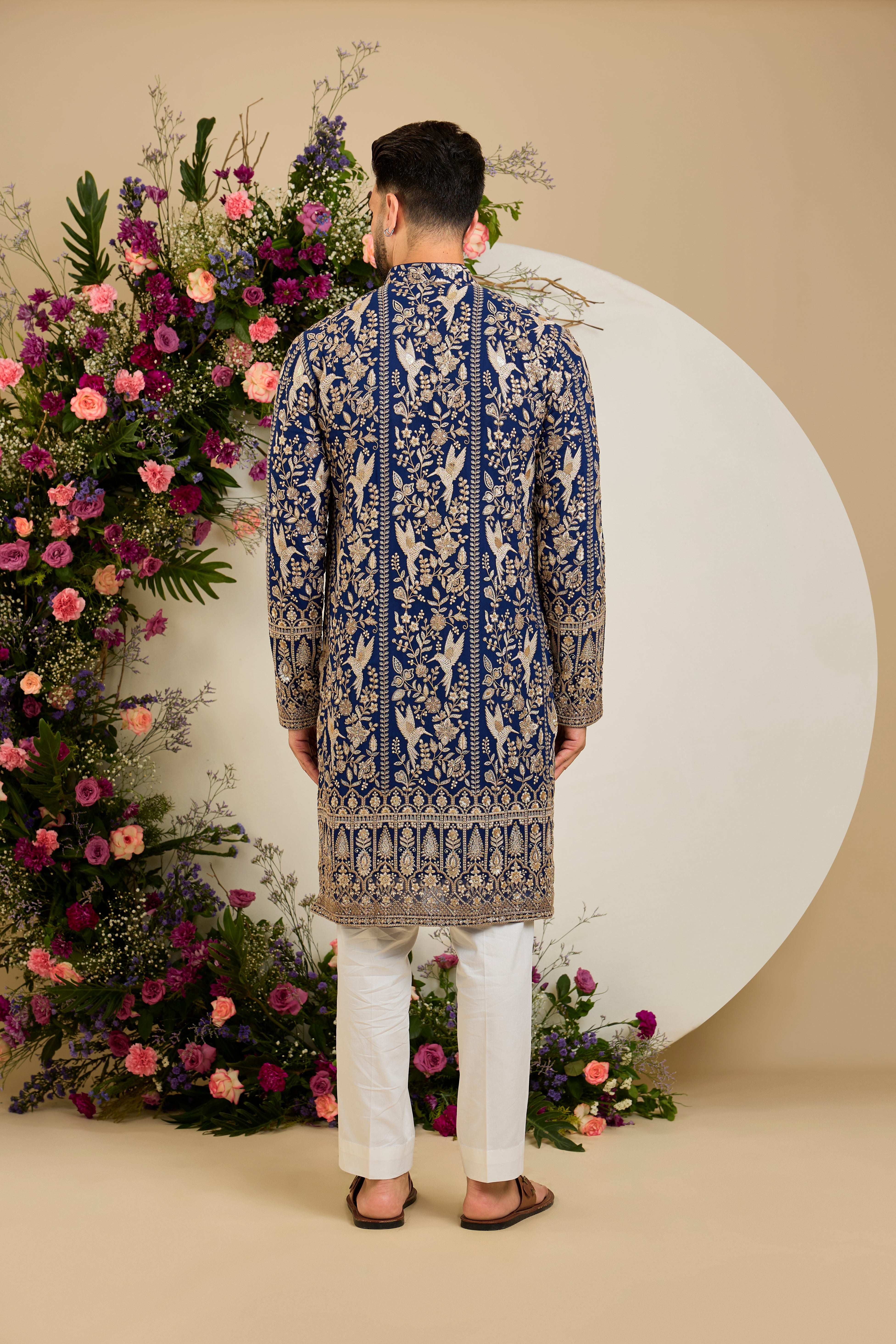Royal blue flora & fauna kurta with intricate sequin and zari detailing, tailored for timeless elegance and distinguished celebrations.
