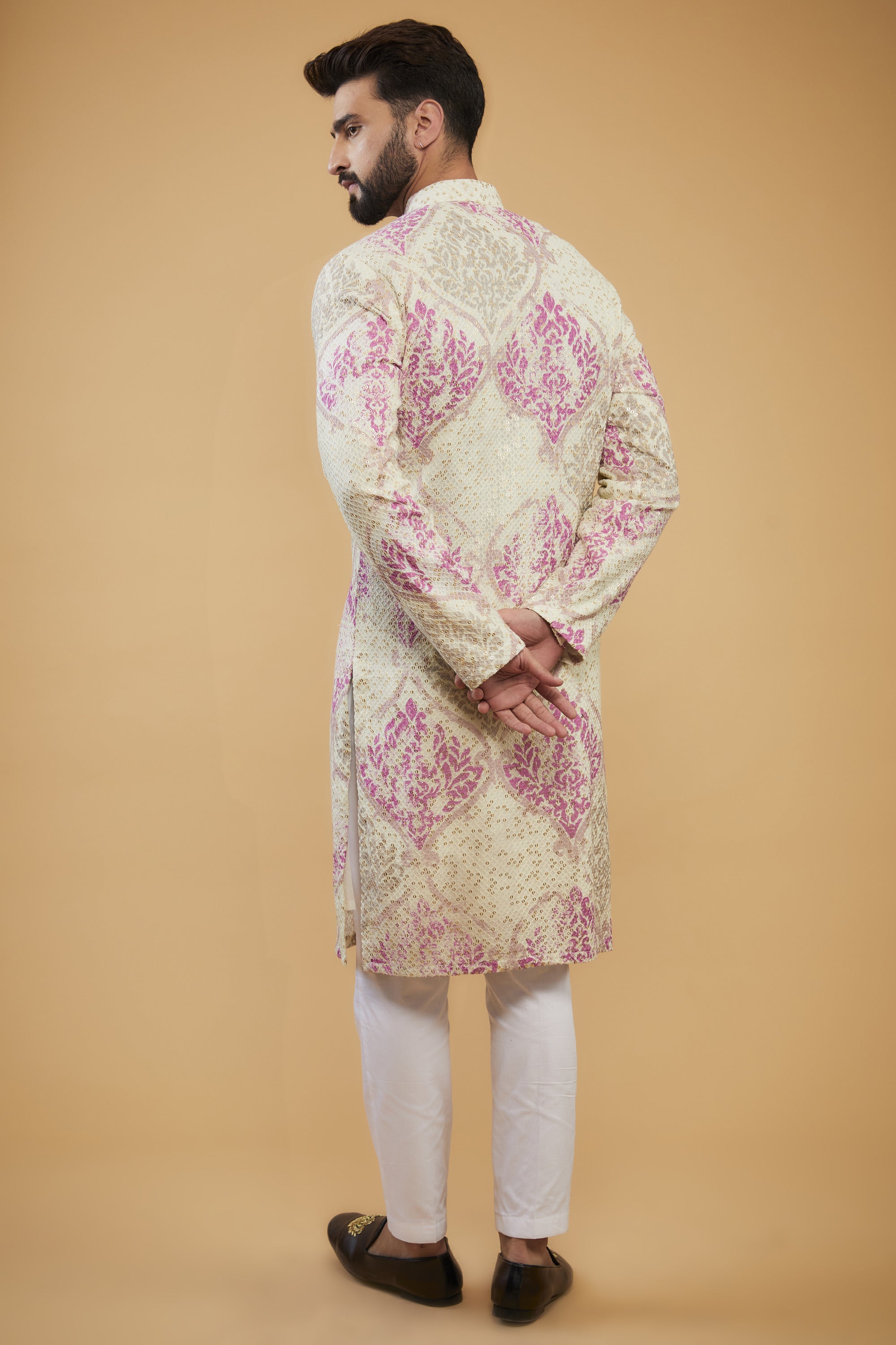 Cream and pink chikankari kurta embellished with intricate thread and sequin embroidery on print - kasbahmen