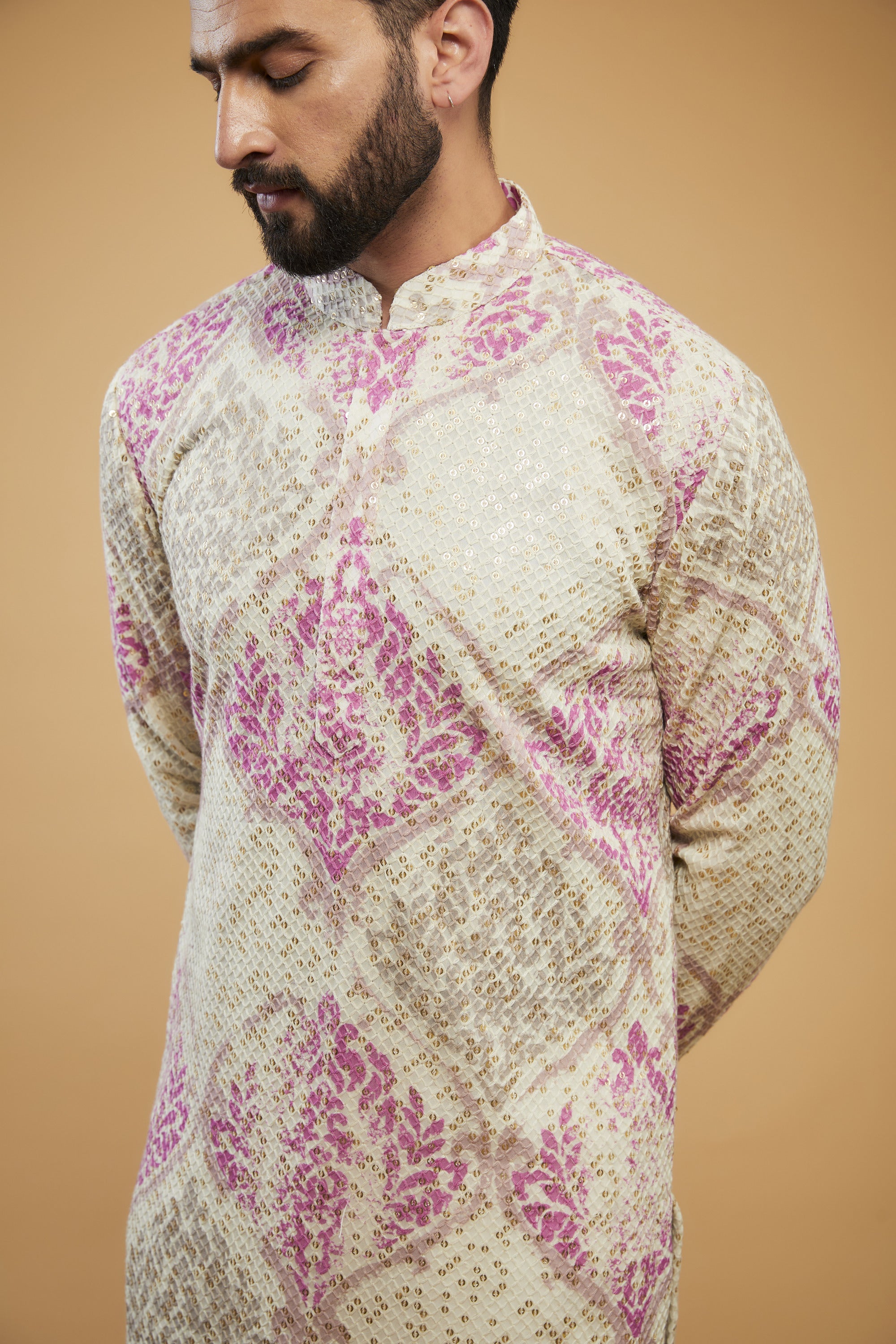 Cream and pink chikankari kurta embellished with intricate thread and sequin embroidery on print - kasbahmen