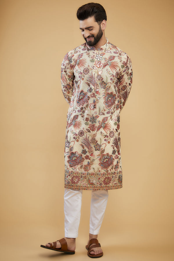 Cream Flora-Fauna Heavy embroidered kurta wuth intricate multi-threadwork and gold leather patchwork