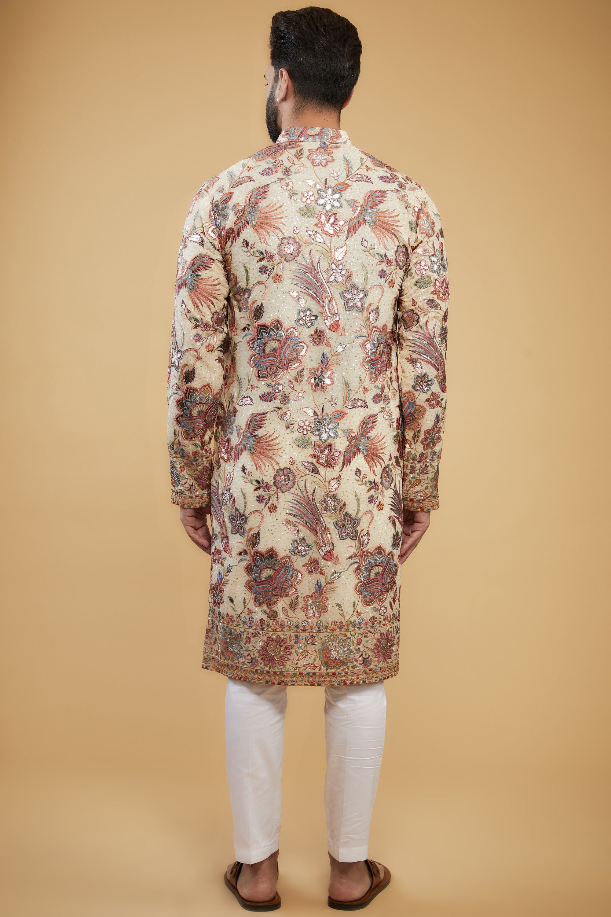 Cream Flora-Fauna Heavy embroidered kurta wuth intricate multi-threadwork and gold leather patchwork - kasbahmen