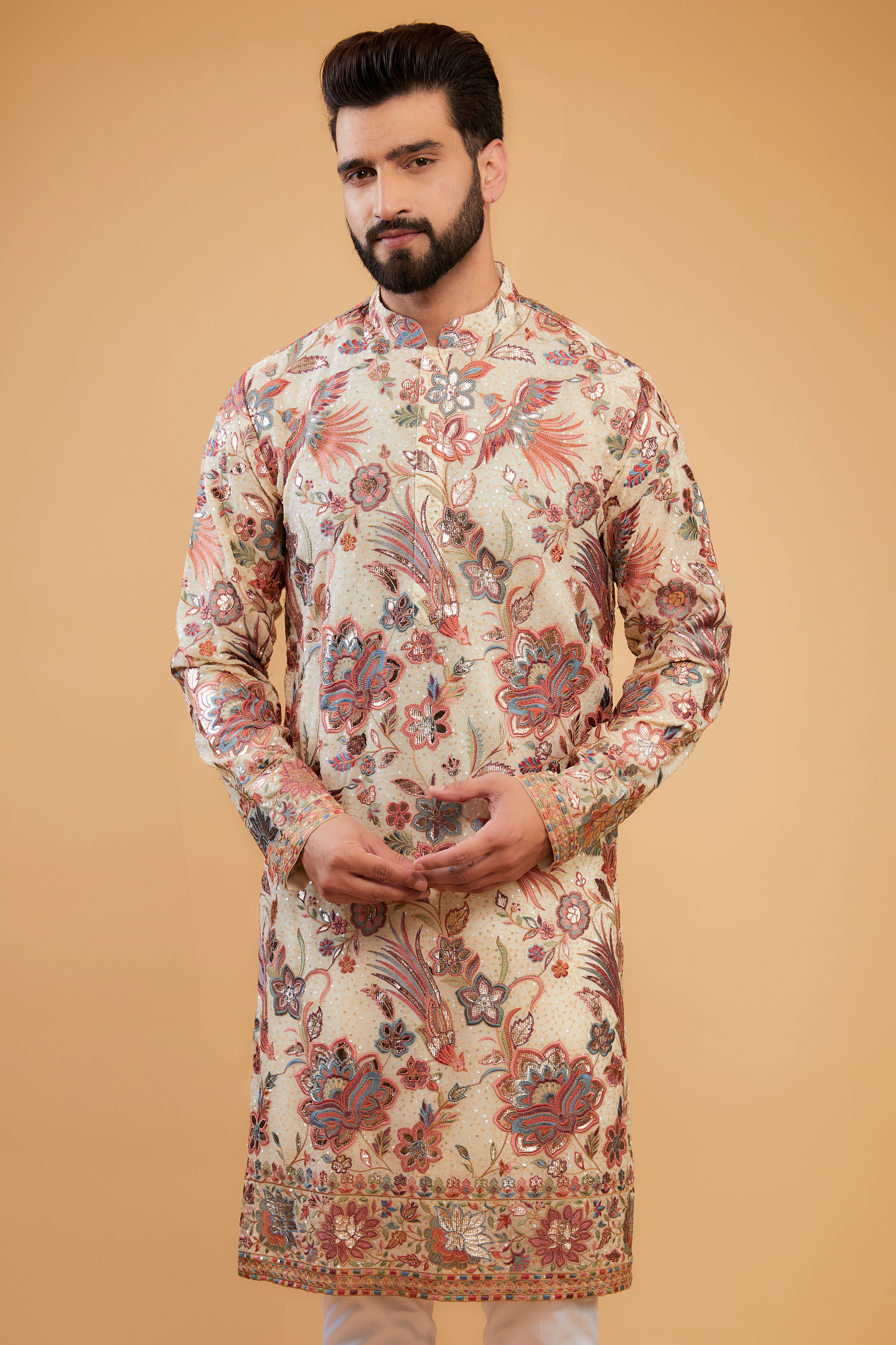 Cream Flora-Fauna Heavy embroidered kurta wuth intricate multi-threadwork and gold leather patchwork - kasbahmen