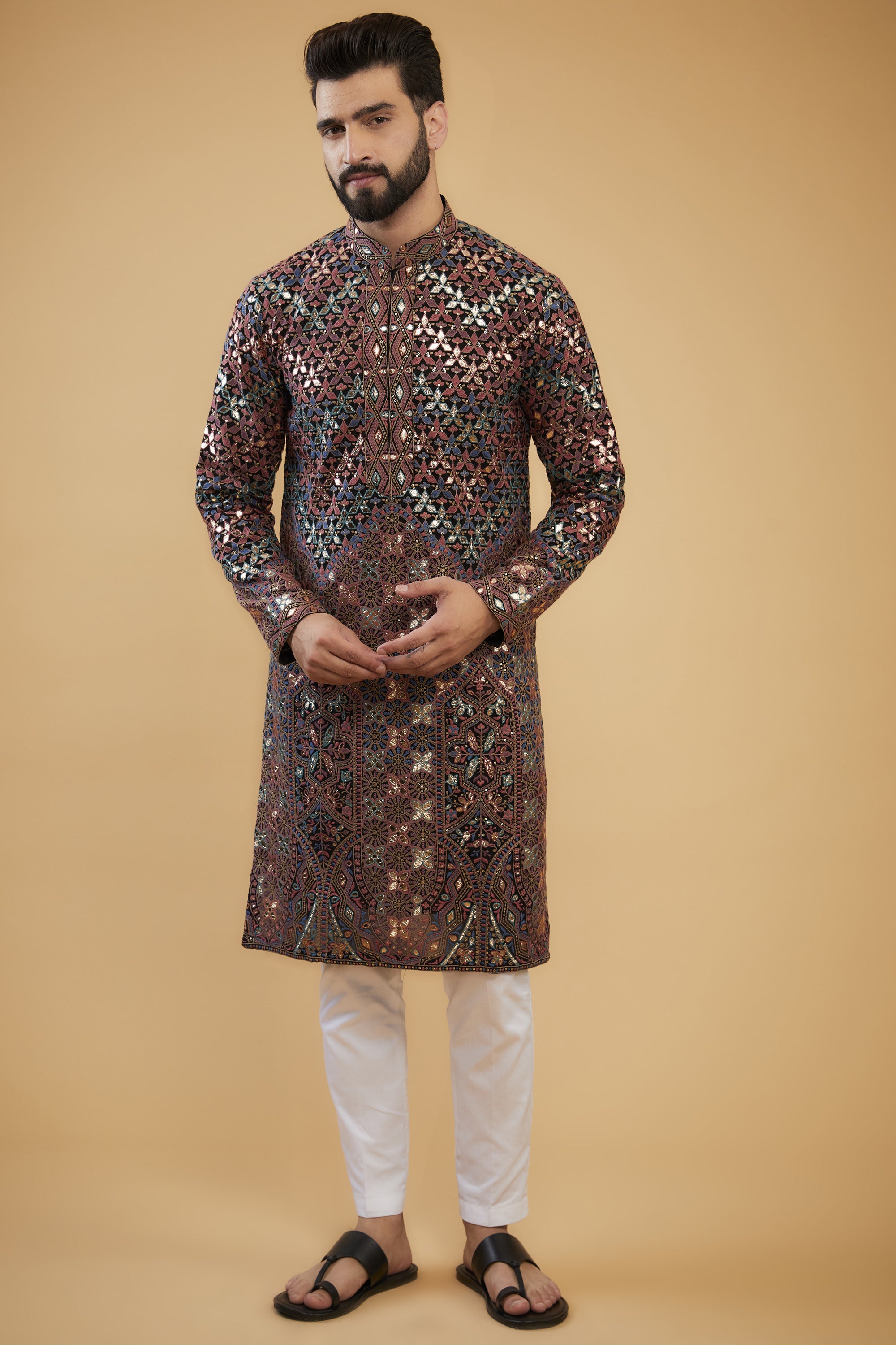 Black Chikankari kurta with intricate multi-thread work, detailed neckline and gold leather patch-work. - kasbahmen