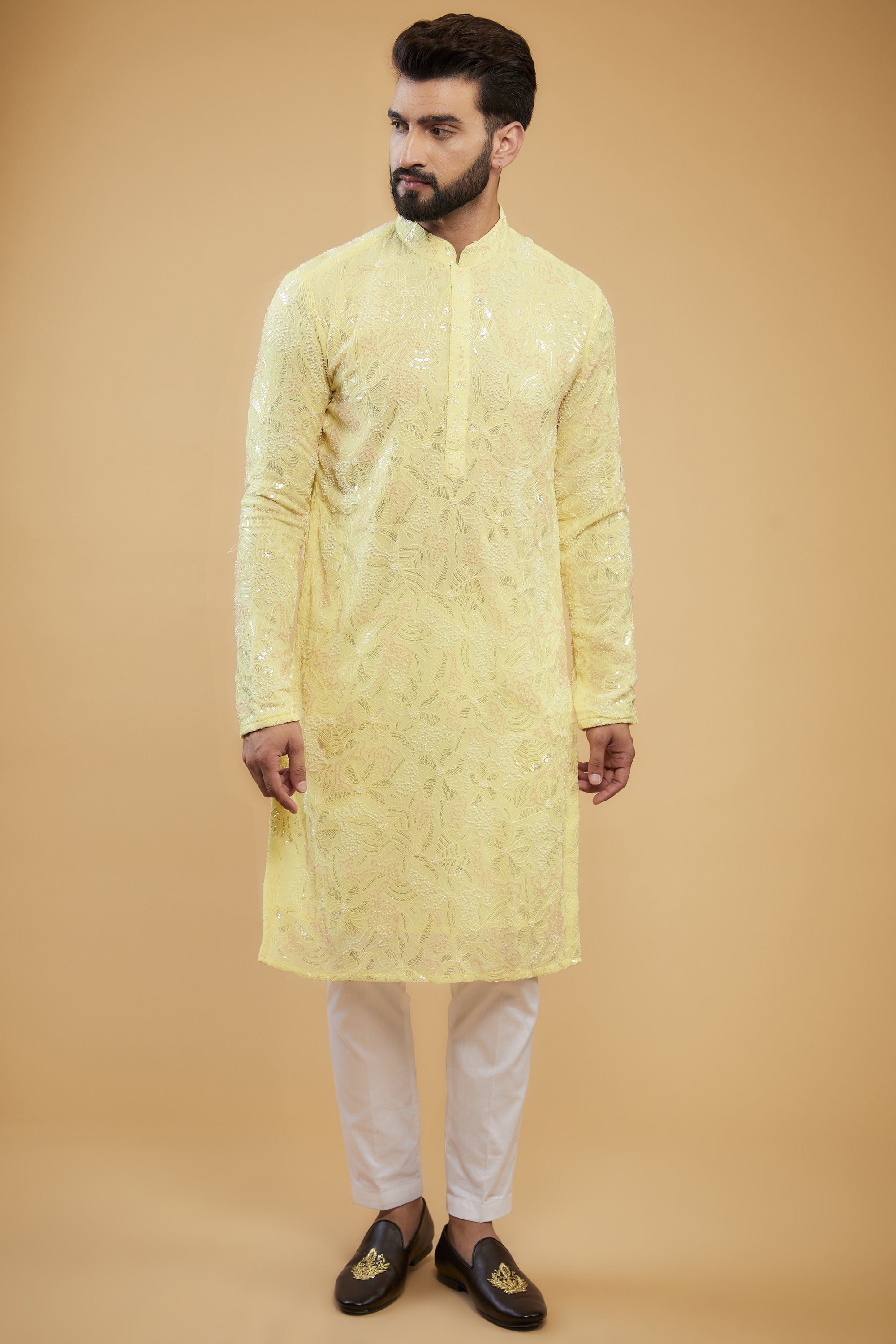 Yellow chikankari kurta with an intricate amalagamation of cut-dana, sequins and thread-work. - kasbahmen