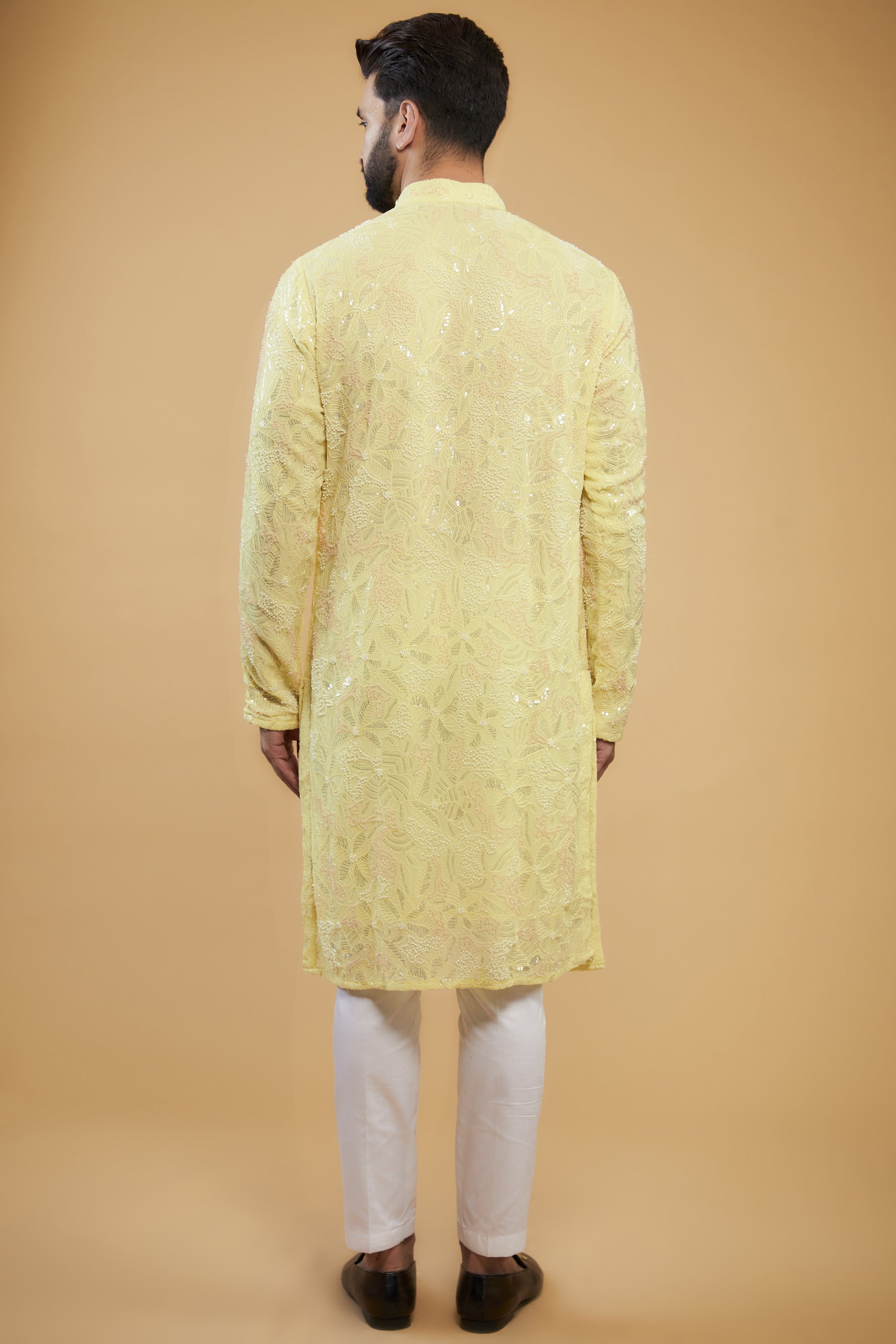 Yellow chikankari kurta with an intricate amalagamation of cut-dana, sequins and thread-work. - kasbahmen