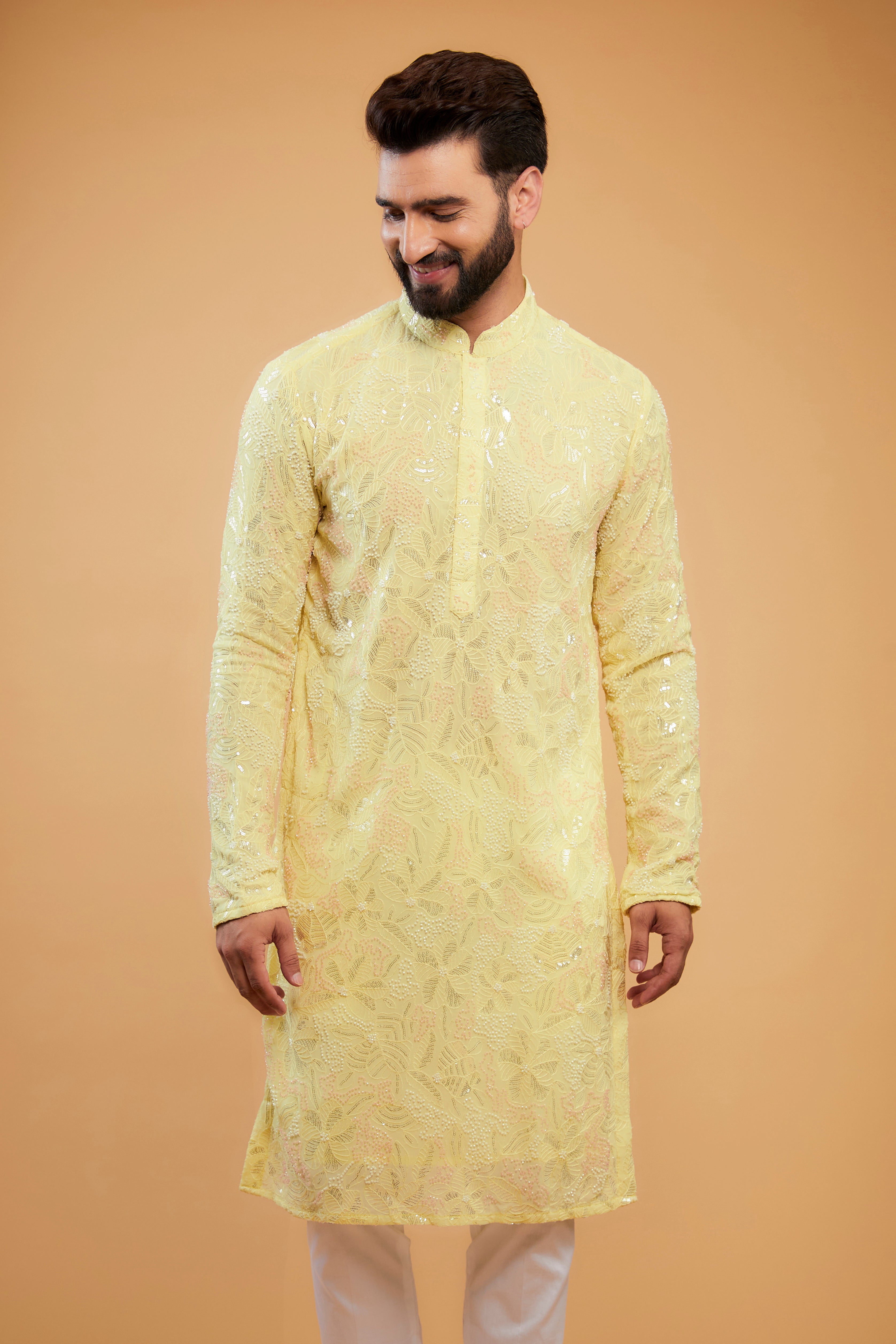 Yellow chikankari kurta with an intricate amalagamation of cut-dana, sequins and thread-work. - kasbahmen