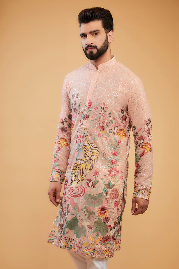 Peach Flora-fauna embroidered kurta with intricate multi-threadwork and tone-to-tone sequins.