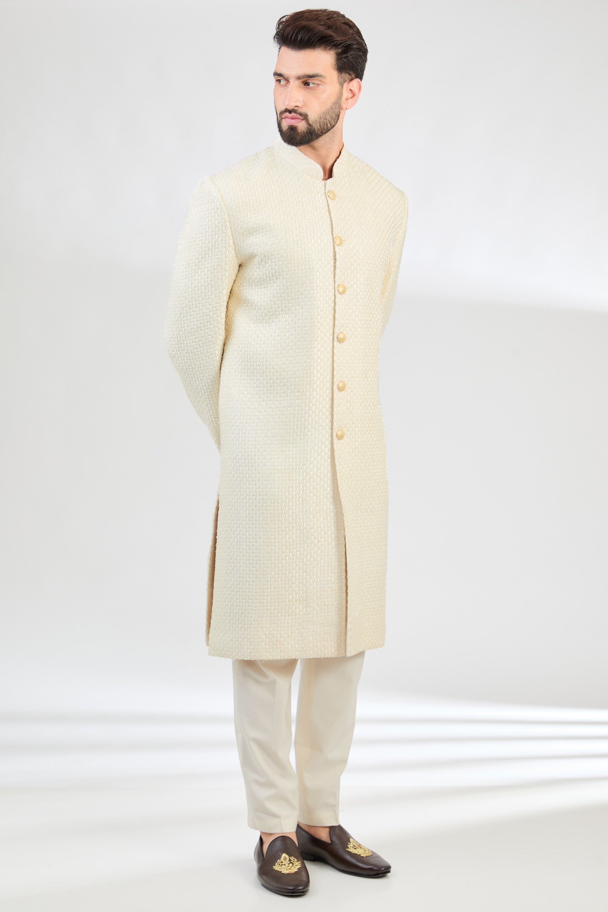 Classic Cream sherwani with detailed cut-dana and heavy thread work. - kasbahmen