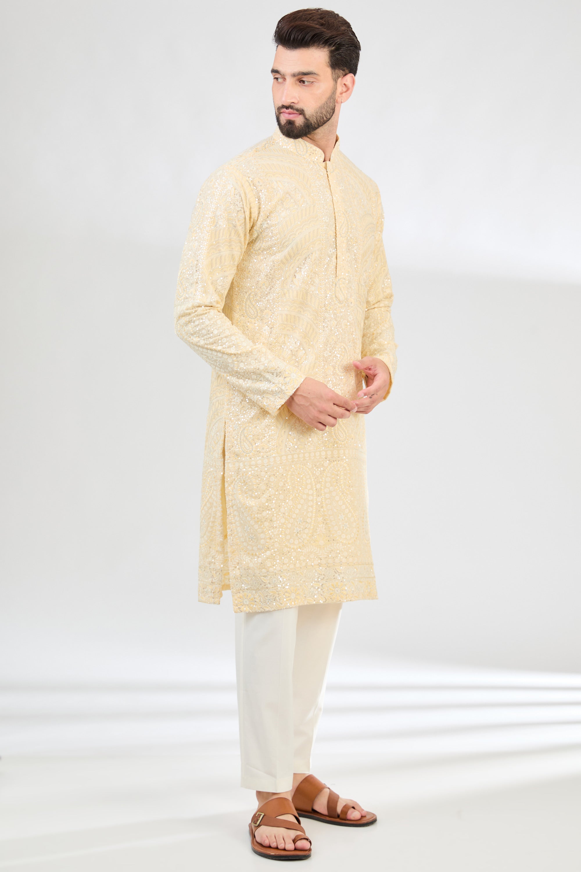 Lemon yellow chikankari kurta with detailed paisley motifs. - kasbahmen