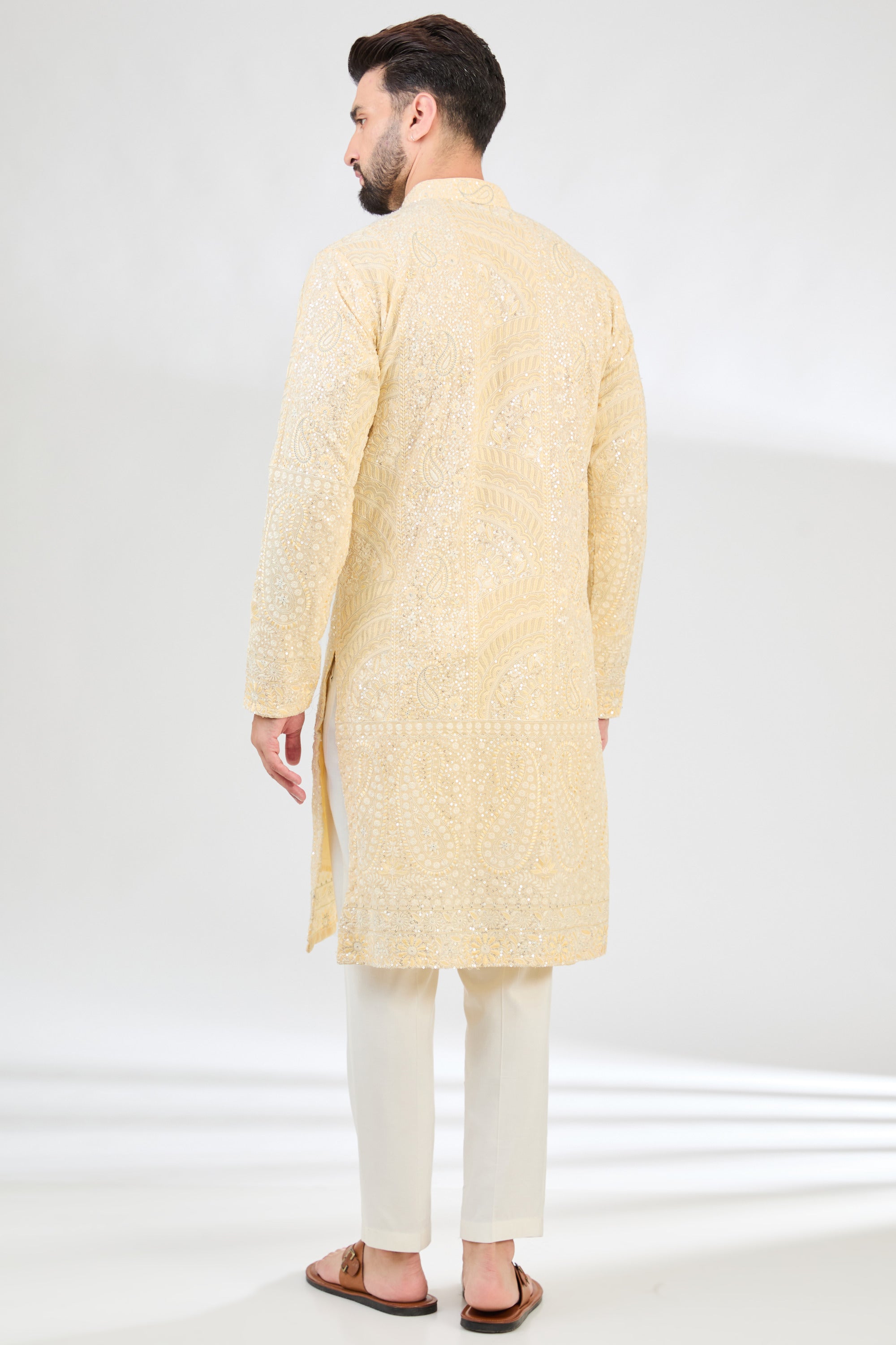 Lemon yellow chikankari kurta with detailed paisley motifs. - kasbahmen