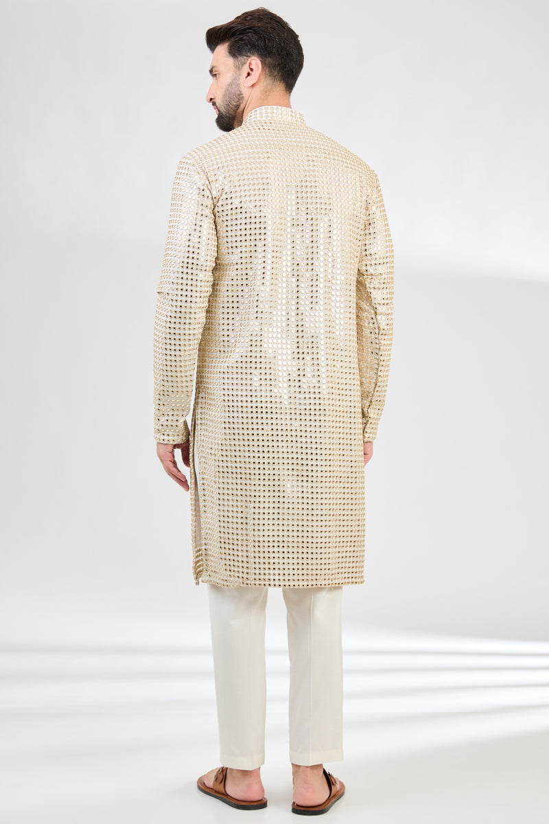 Cream mirror-work kurta with intricate golden zari detailing. - kasbahmen