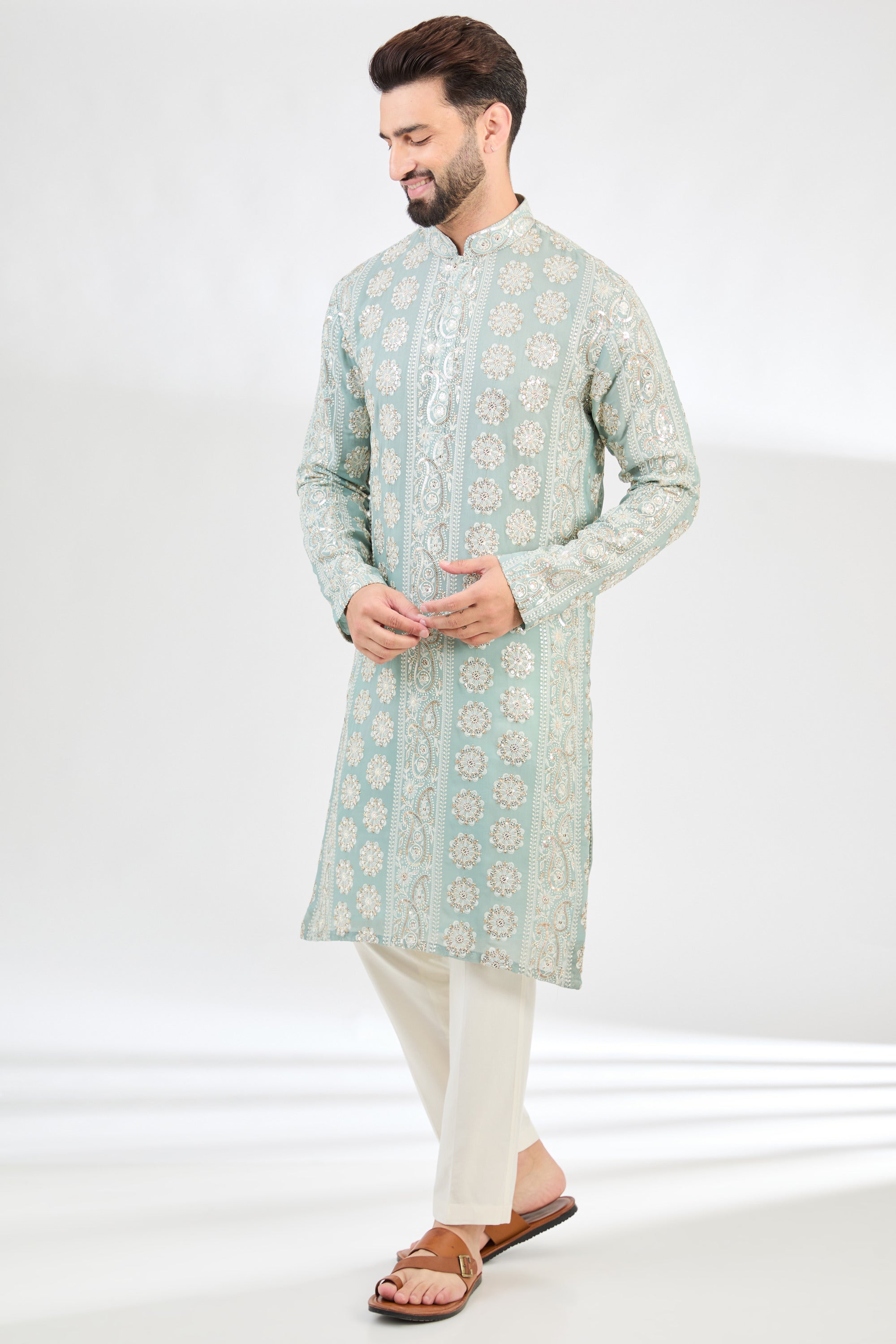 Aqua-blue chikankari kurta with detailed paisley motifs. - kasbahmen