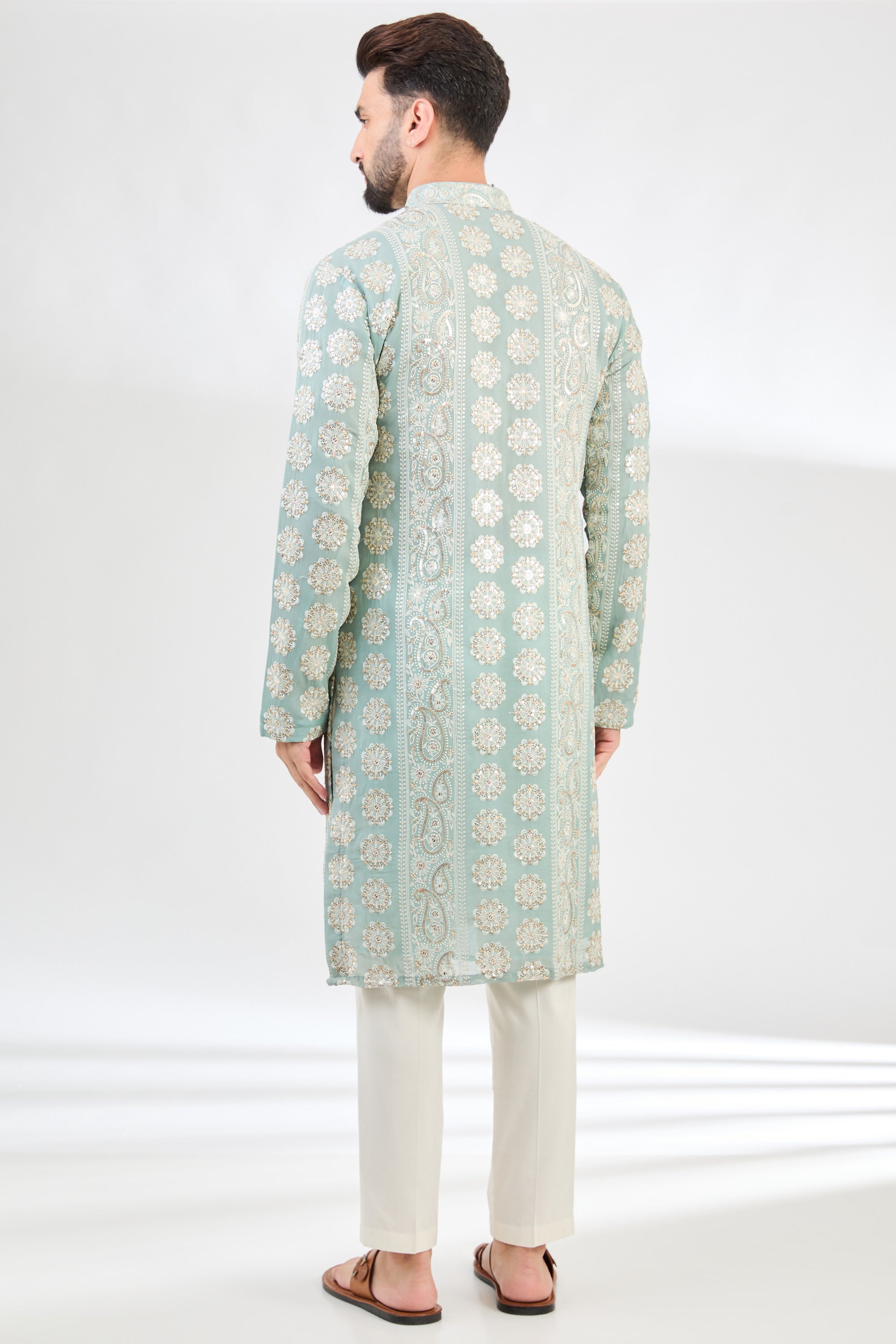 Aqua-blue chikankari kurta with detailed paisley motifs. - kasbahmen