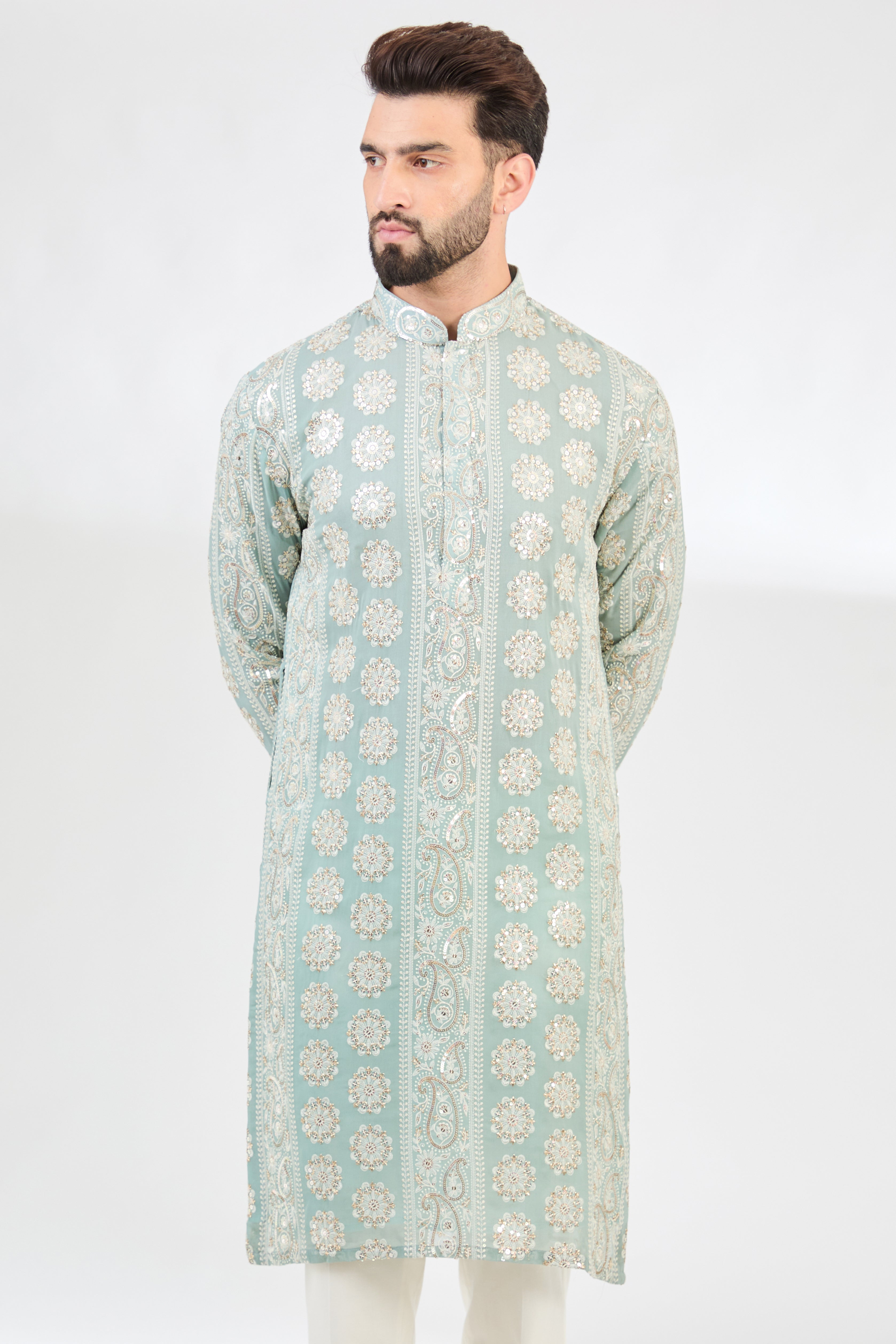 Aqua-blue chikankari kurta with detailed paisley motifs. - kasbahmen