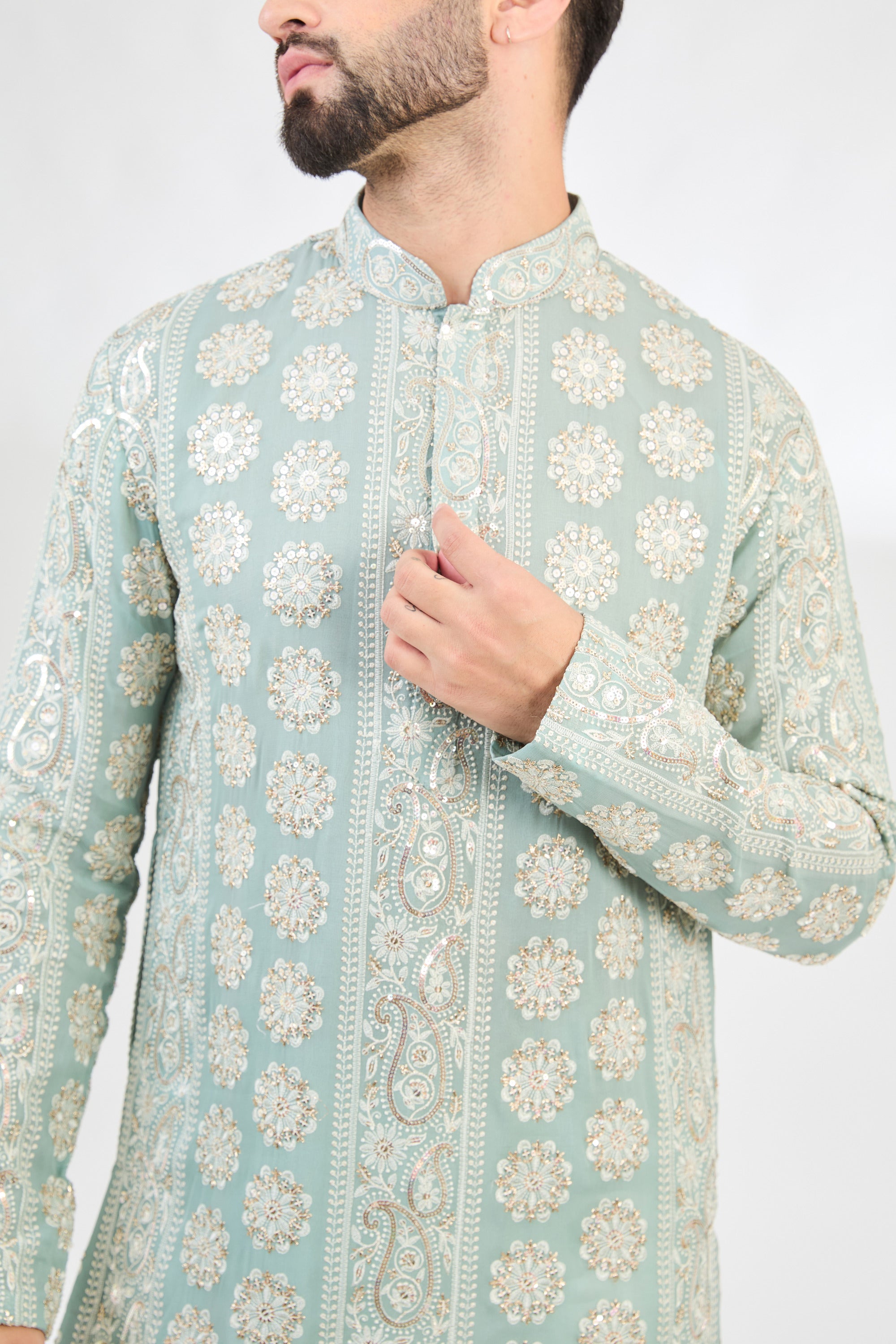 Aqua-blue chikankari kurta with detailed paisley motifs. - kasbahmen