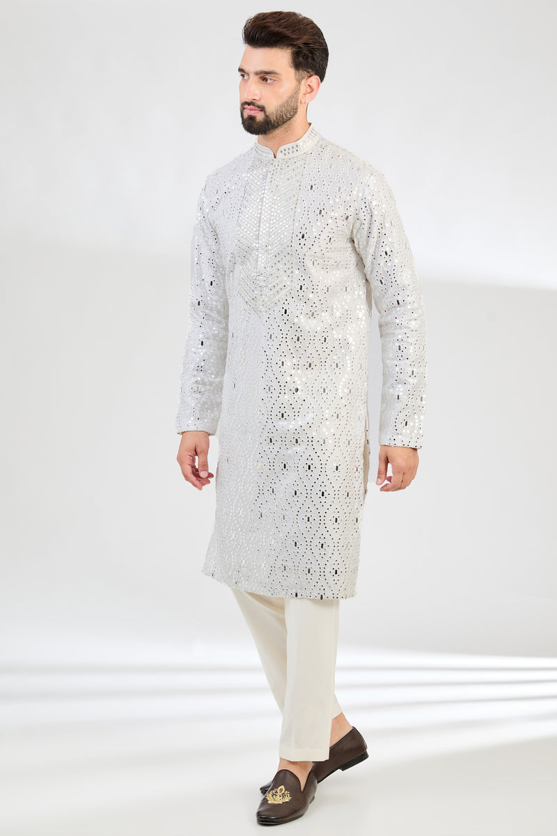 White mirror-work kurta with intricate hand embroidered neckline. - kasbahmen